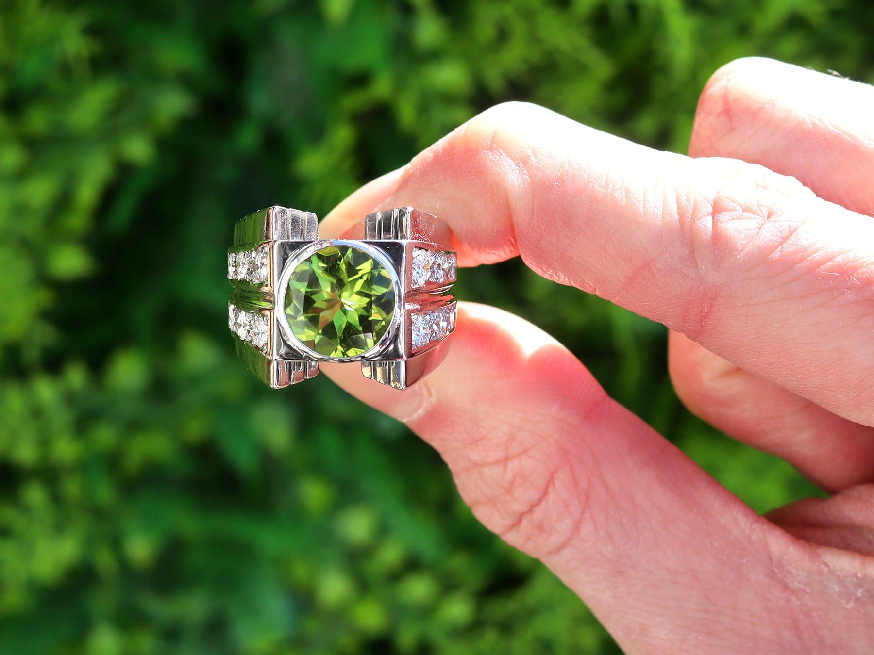 A stunning, fine and impressive vintage 3.41 carat peridot and 1.20 carat diamond and platinum cocktail ring; part of our diverse diamond jewellery and estate jewelry collections.

This stunning, fine and impressive vintage ring has been crafted in