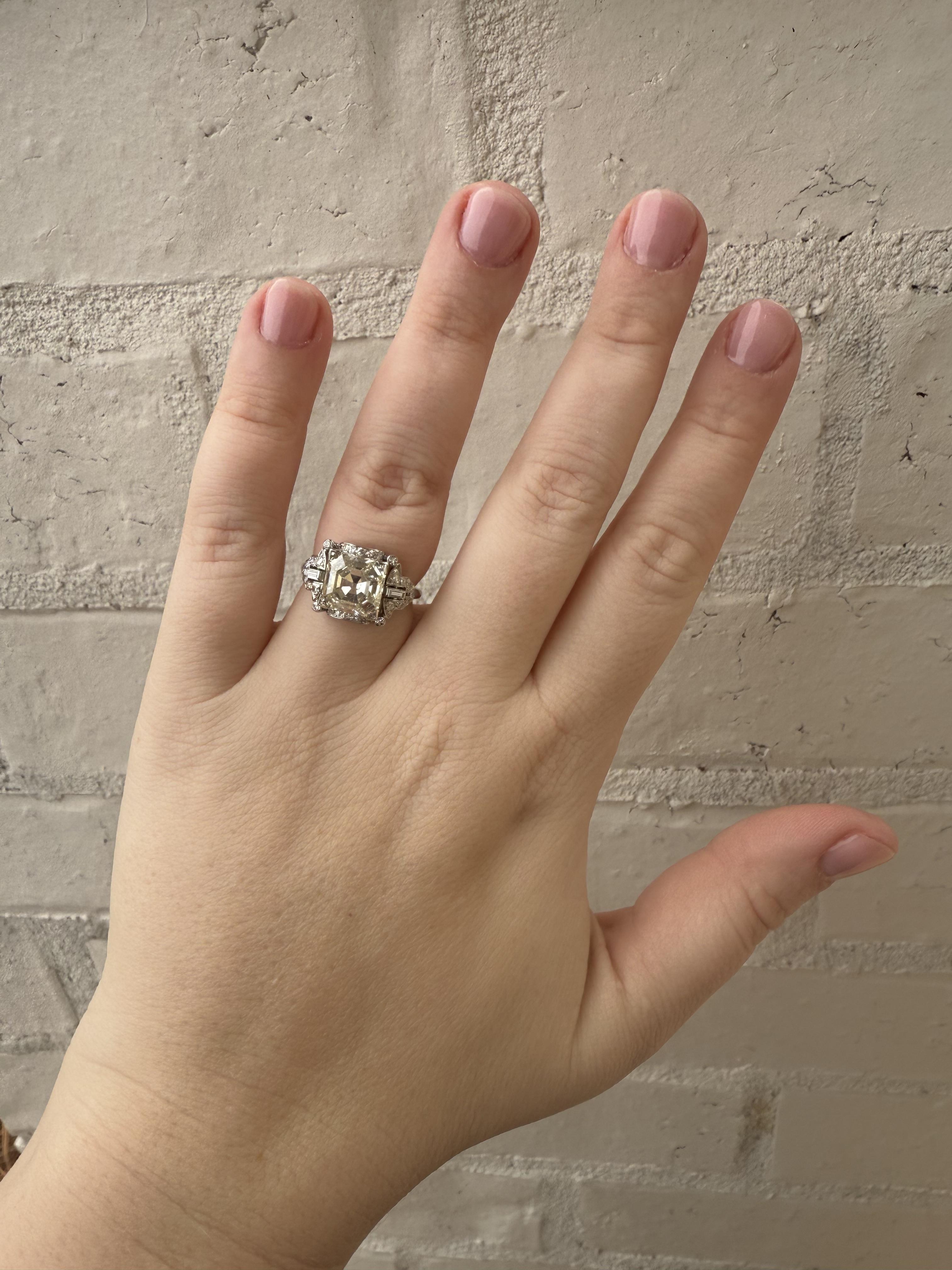 We are thrilled to offer this vintage beauty!!!

Ring Details
Material: Platinum
Era: Art Deco 1920 - 1940
Head Width: 12mm
Head Height: 6.5mm
Weight: 6.0 Grams
Finger Size: 6 1/2
Sizable Upon Request

Accented by the following gemstones
1 - 9.26mm