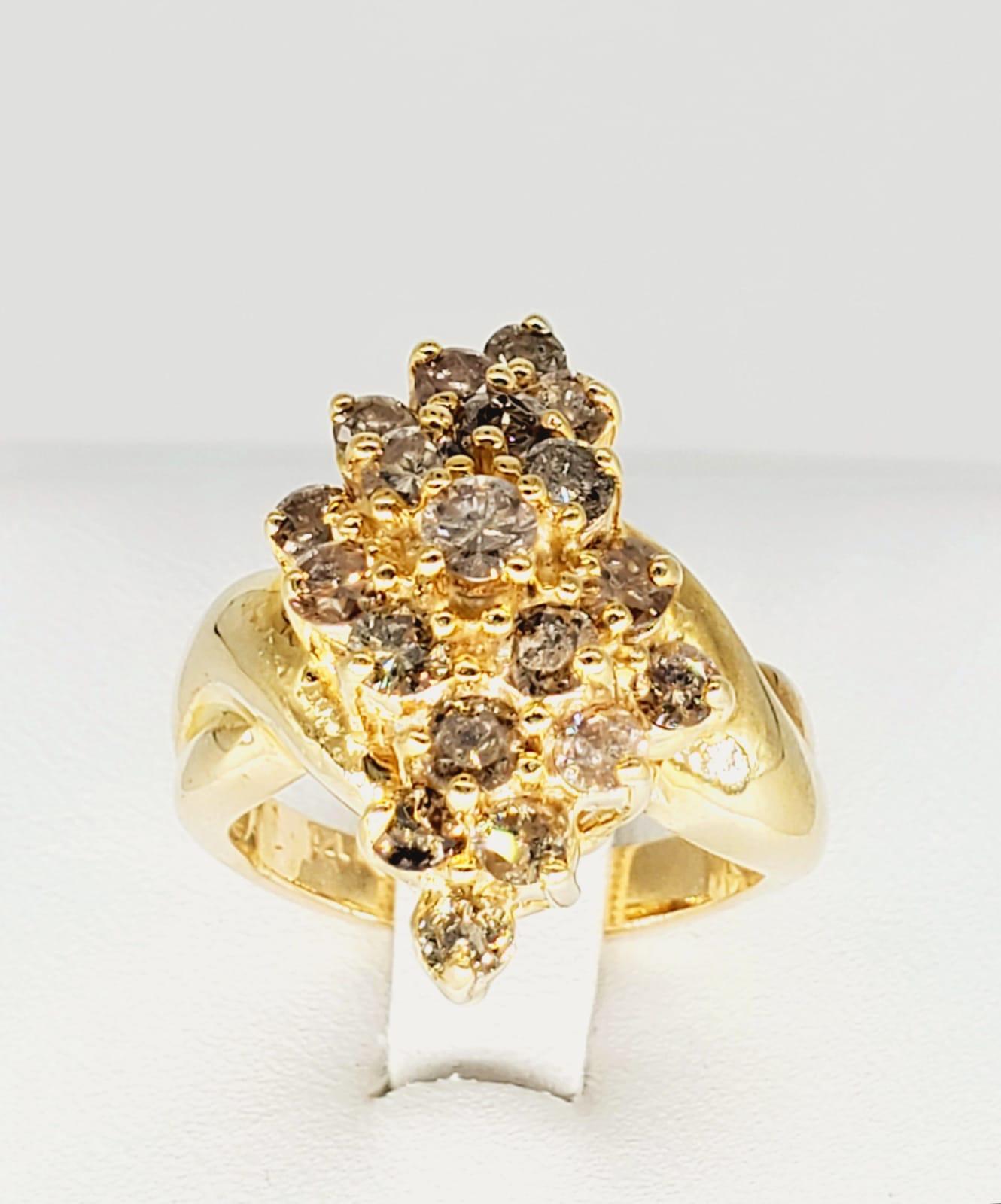 Vintage 3.50 Carat Sparkling Champagne Diamonds Cluster Ring. This ring is very sparkly when light hits it. The round champagne diamonds are brought together to make this stunning ring that covers a big part on the finger making it stand out