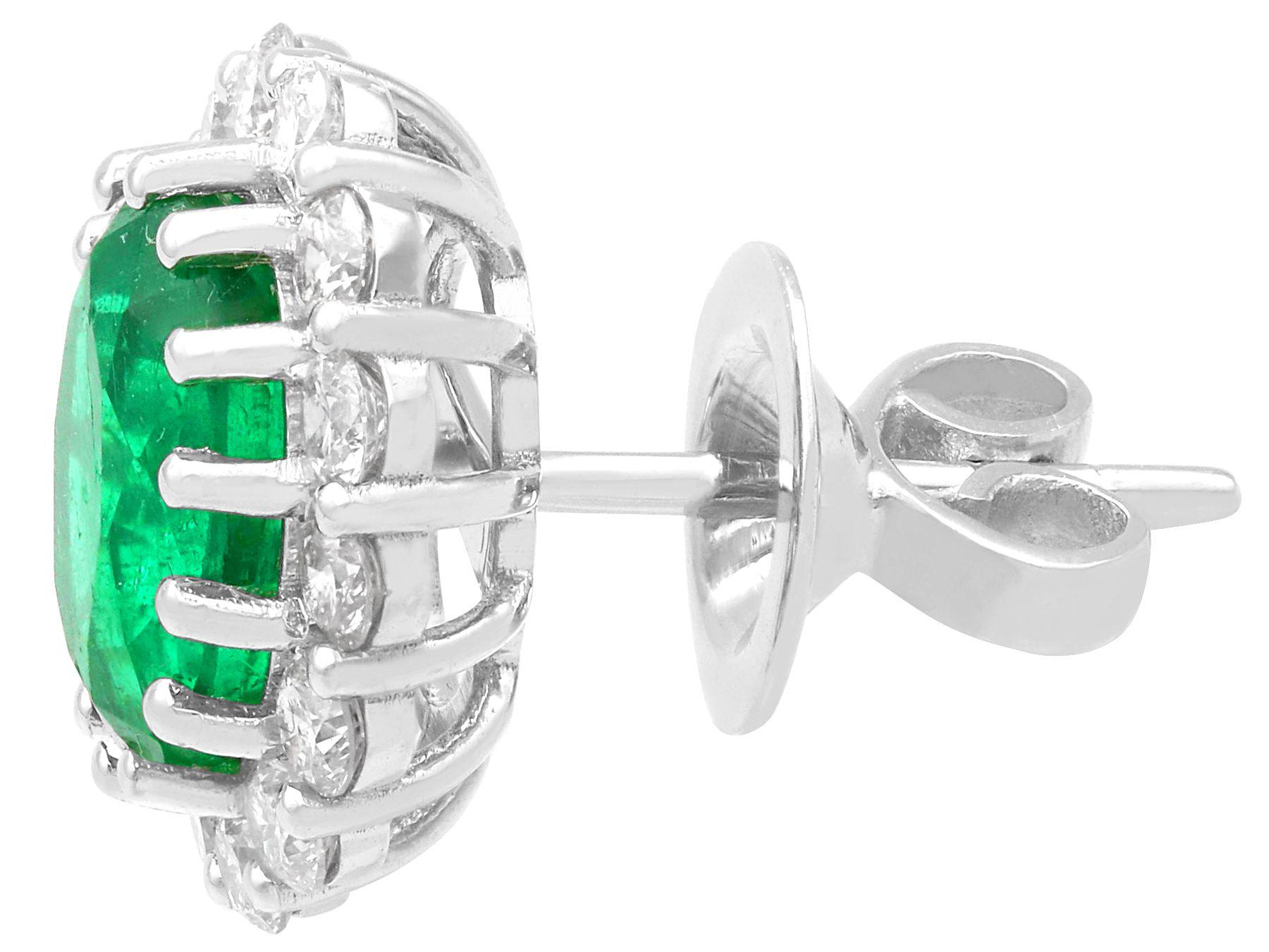 Oval Cut Vintage 3.50ct Emerald and 0.70ct Diamond Cluster Earrings in 18ct White Gold For Sale