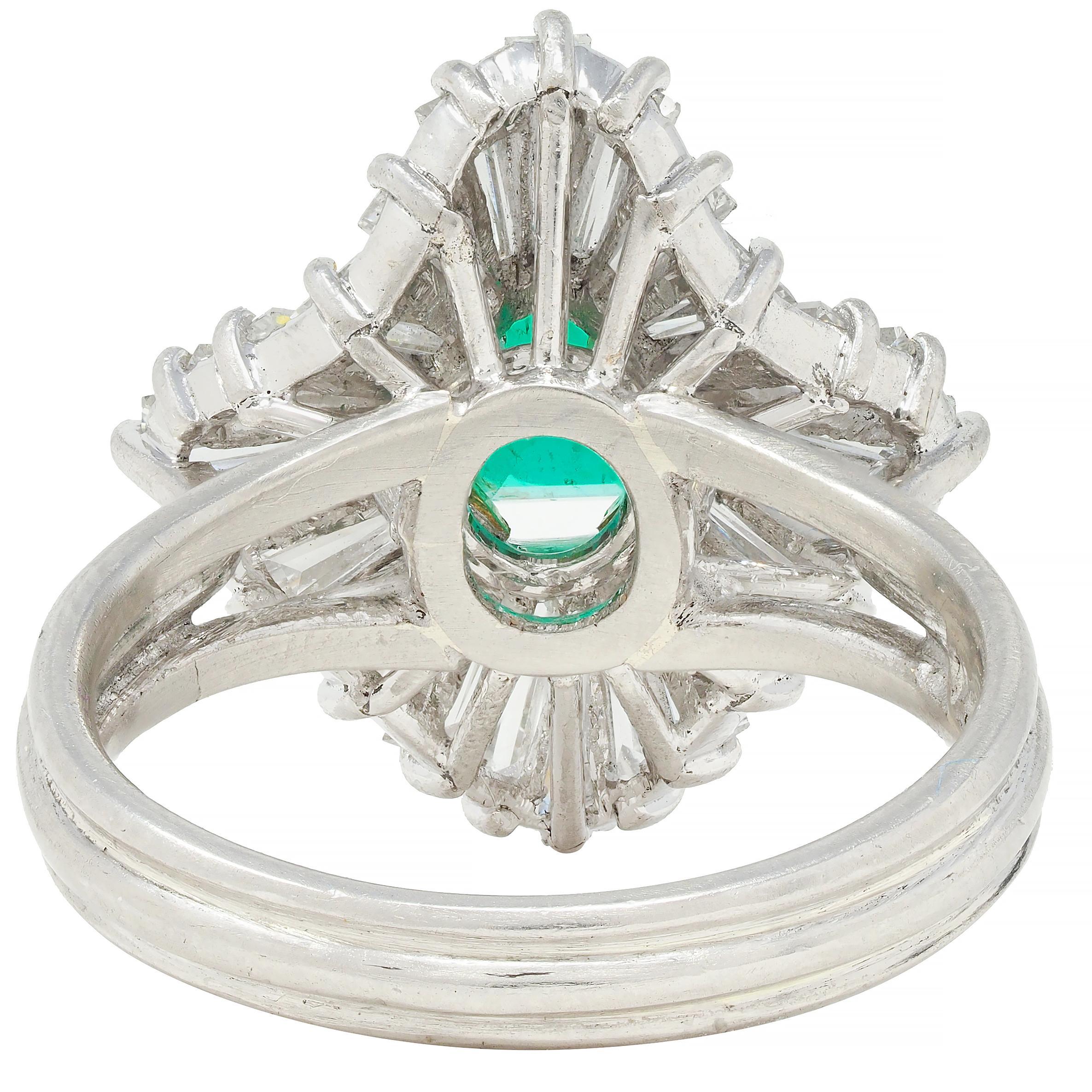 Vintage 3.58 CTW Emerald Diamond Platinum 18 Karat Gold Ballerina Halo Ring In Excellent Condition For Sale In Philadelphia, PA