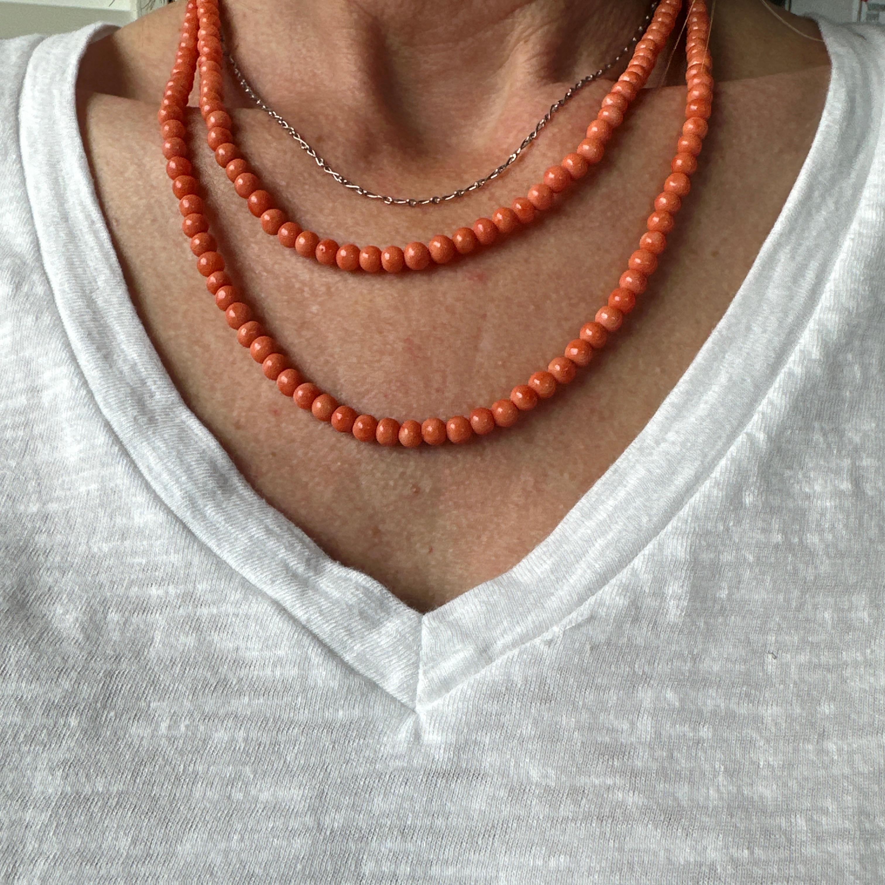 Details:
Lovely vintage strand of angel skin red coral. Measuring a generous length of 36 inches long including the clasp. The gold clasp is adorned with a coral cabochon. It opens and closes securely. This wonderful necklace displays the fantastic