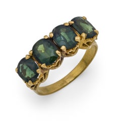 Vintage 3.60 carat green sapphire 4 stone ring