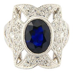 Vintage 3.67ct Oval Sapphire and 0.56ctw Pave Diamond Ring in Platinum