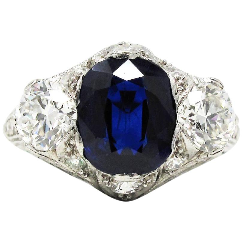 Vintage Cushion Unheated Blue Sapphire GIA and Diamond 3 Stone Ring in Platinum For Sale