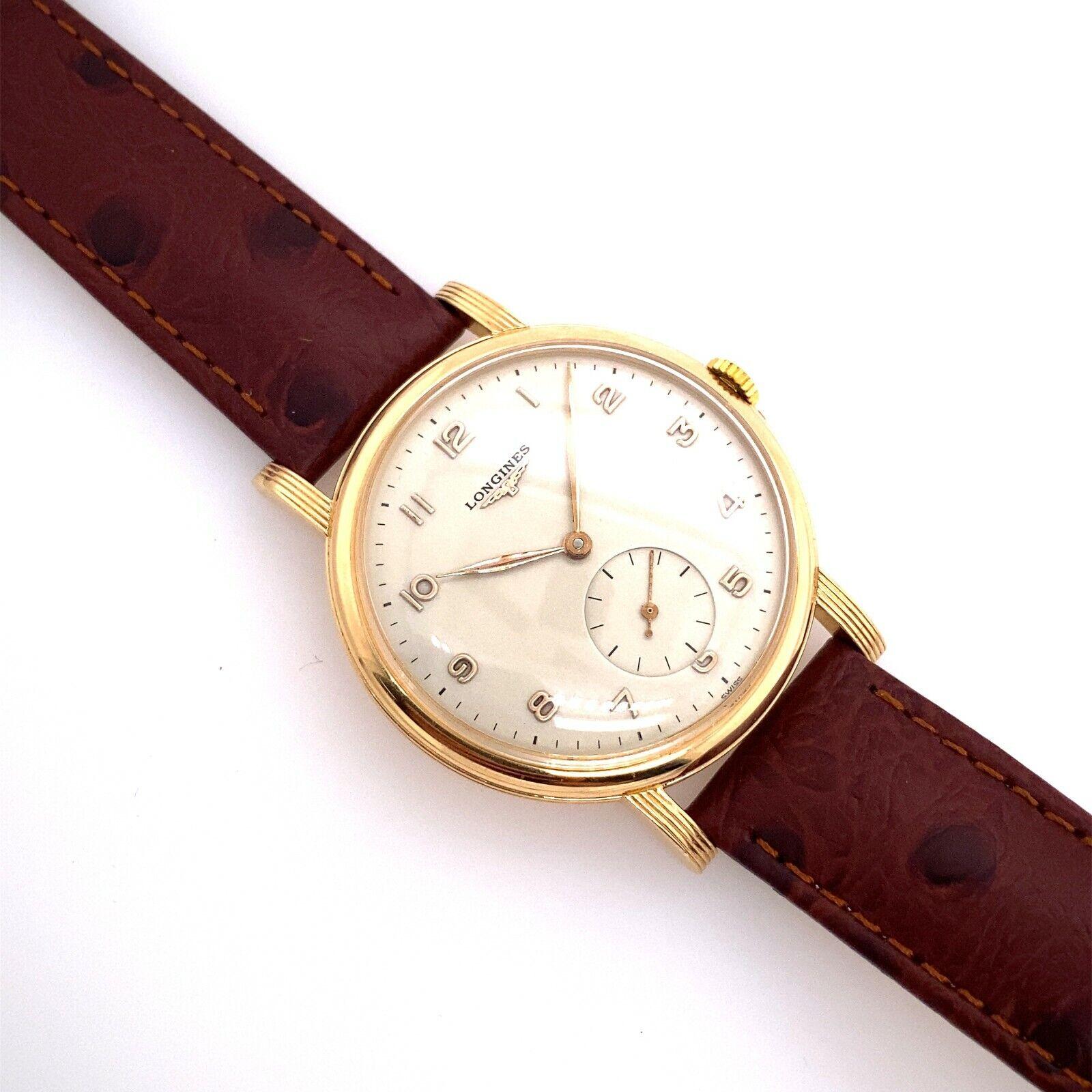 Vintage 18ct Rosy/Yellow Gold 38mm Longines Mechanical Wristwatch

Additional Information:
Fully Serviced In Perfect Working Condition
Case Size: 38mm
Case Thickness: 8mm
Lug Width: 18 mm
Number of Jewels: 17
Case Material: 9ct gold
Total Weight: