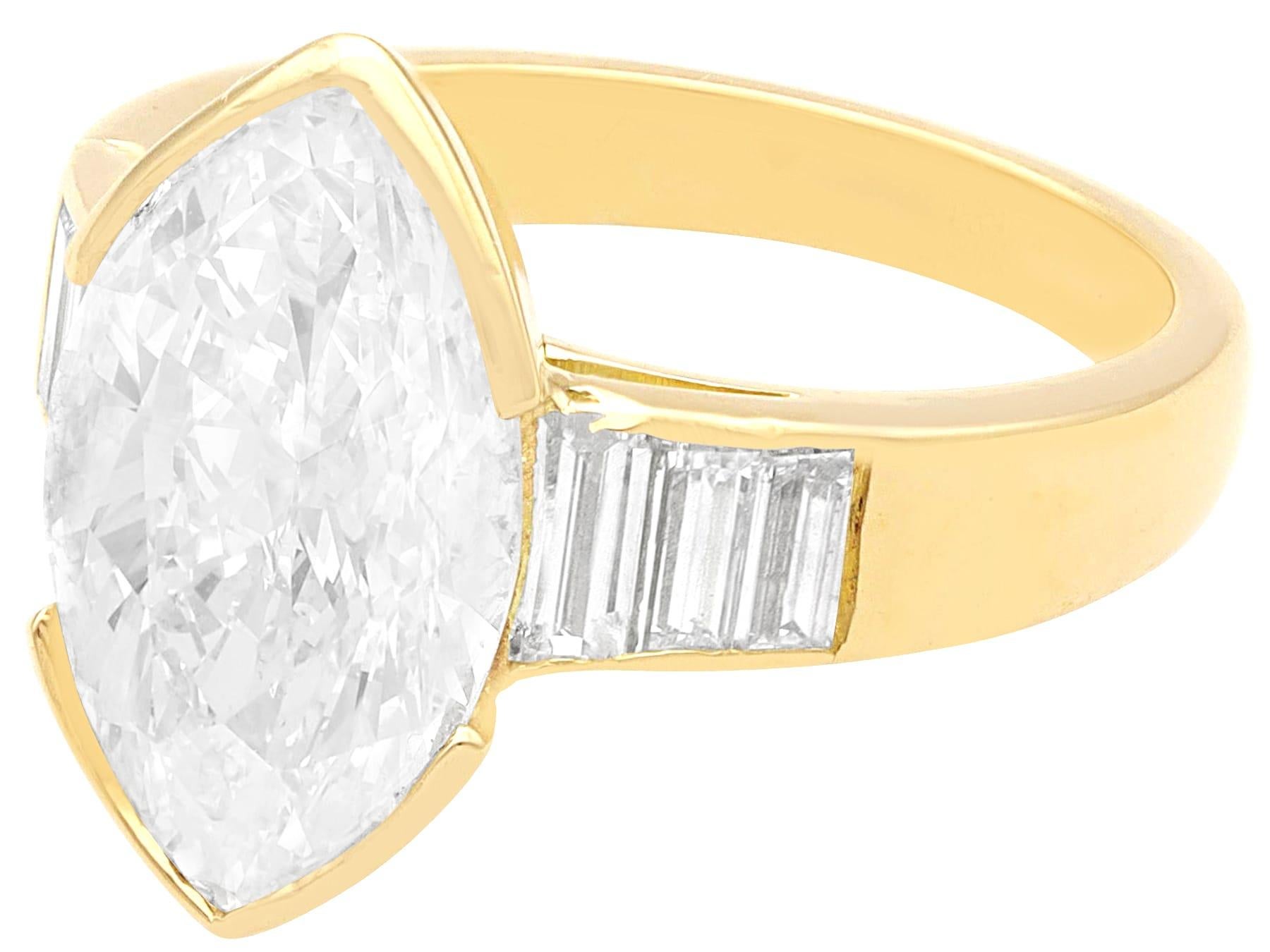 A stunning, fine and impressive, large vintage 3.93 carat diamond, 18 karat yellow gold solitaire ring: part of our vintage jewelry and jewelry collections.

This stunning, fine and impressive vintage diamond ring has been crafted in 18k yellow