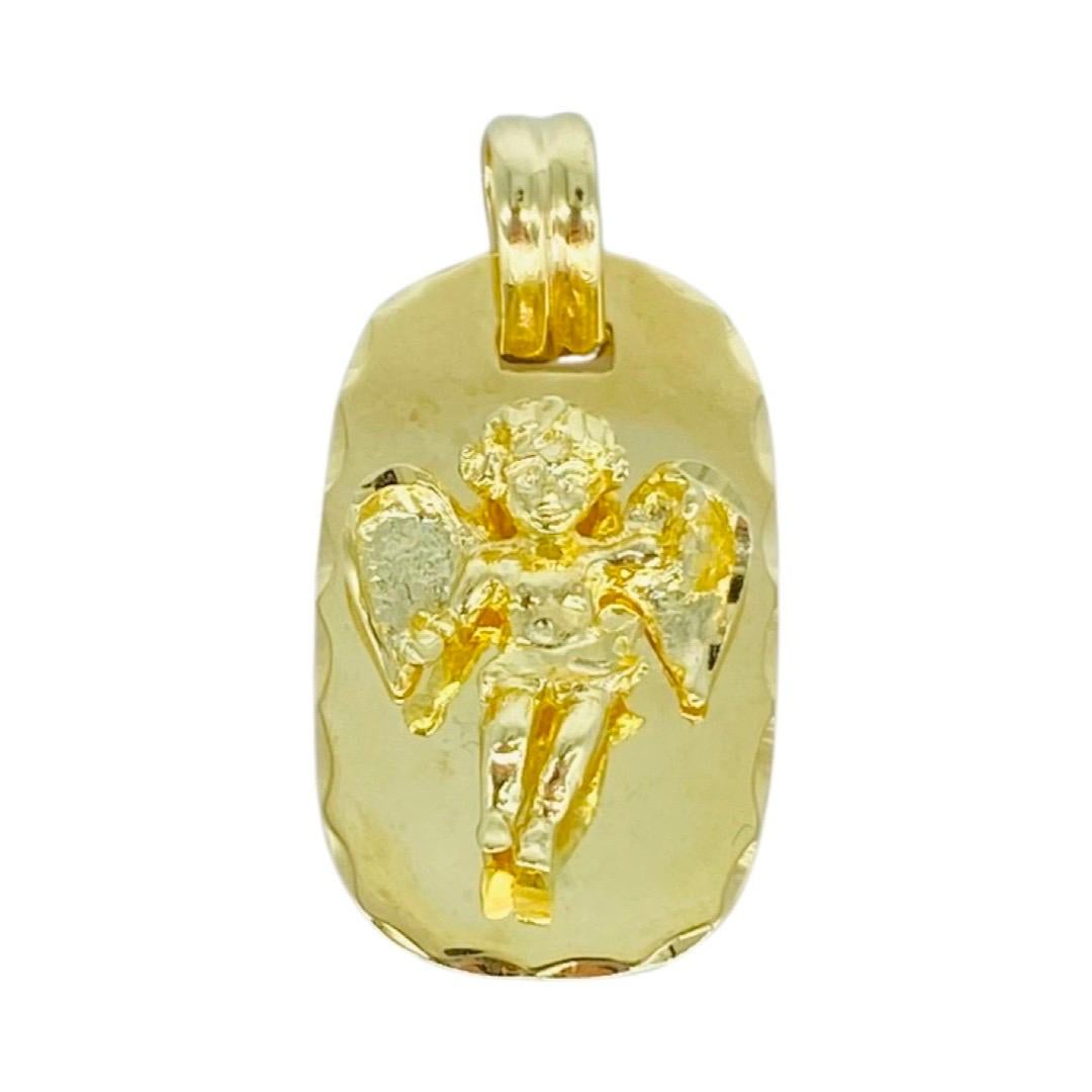 Vintage 3D Angel Pendant 14k Gold Italy. Very detailed out angel pendant with back solid piece and diamond cuts design making this true beauty show. Made in Italy, the pendant measures 25mm X 15mm
The pendant weights 5g