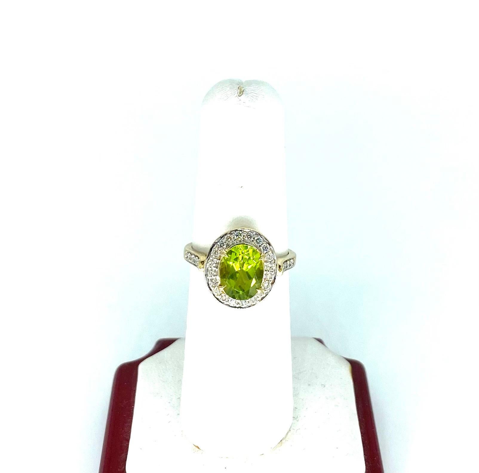 Vintage 4 Carat Peridot & Diamond Cluster Engagement Ring 18k Gold. Gorgeous center Peridot gemstone featuring a surrounding white diamonds throughout. The ring is a size 7 and measures 7mm by 9mm. The ring is made in 18k solid gold and weights 4.6