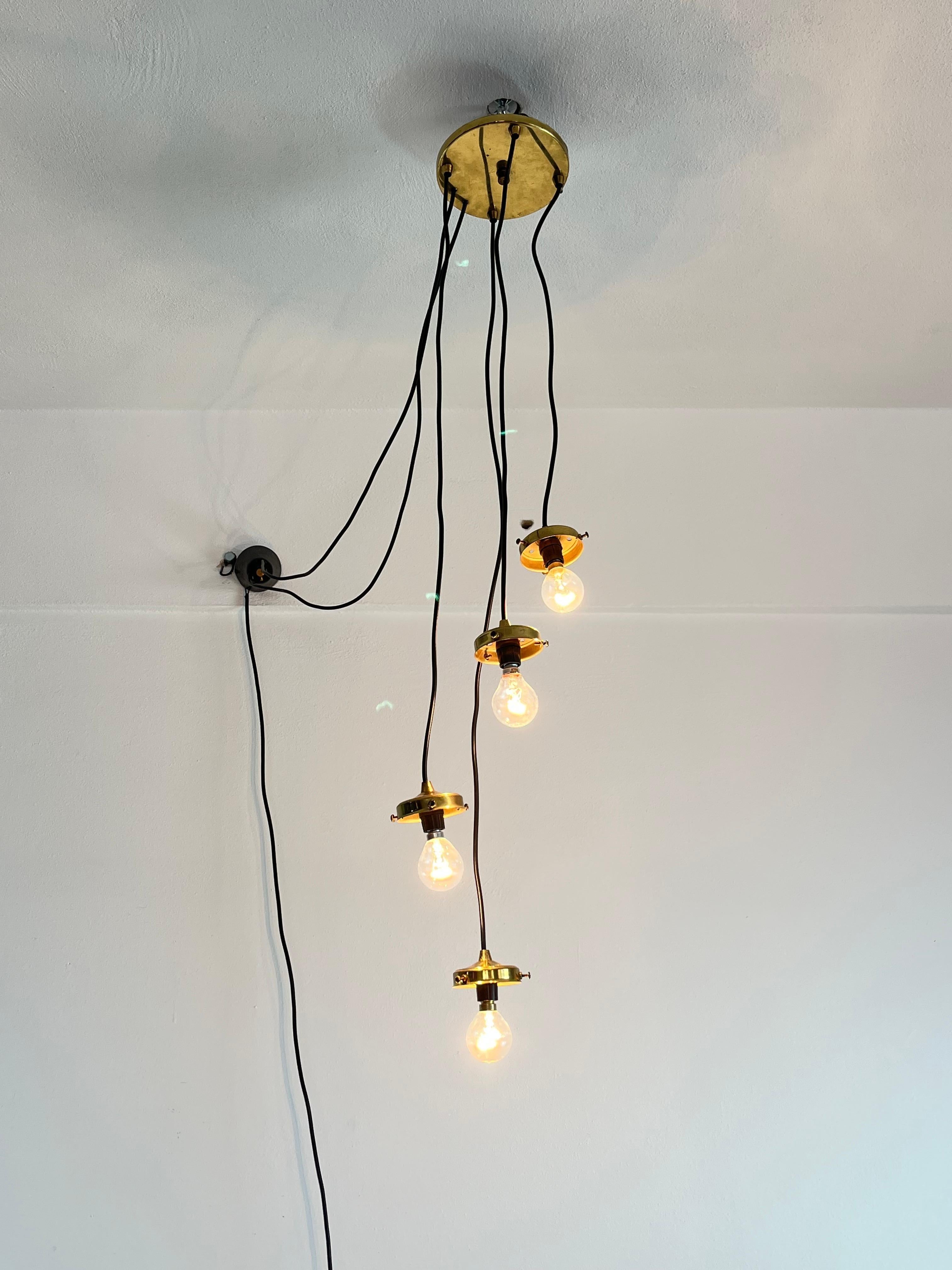 Vintage 4-light suspension lamp, glass, Italy, 1970s
The diameter of each single glass is 13 cm. One has a slight chip that becomes invisible as soon as it is mounted.