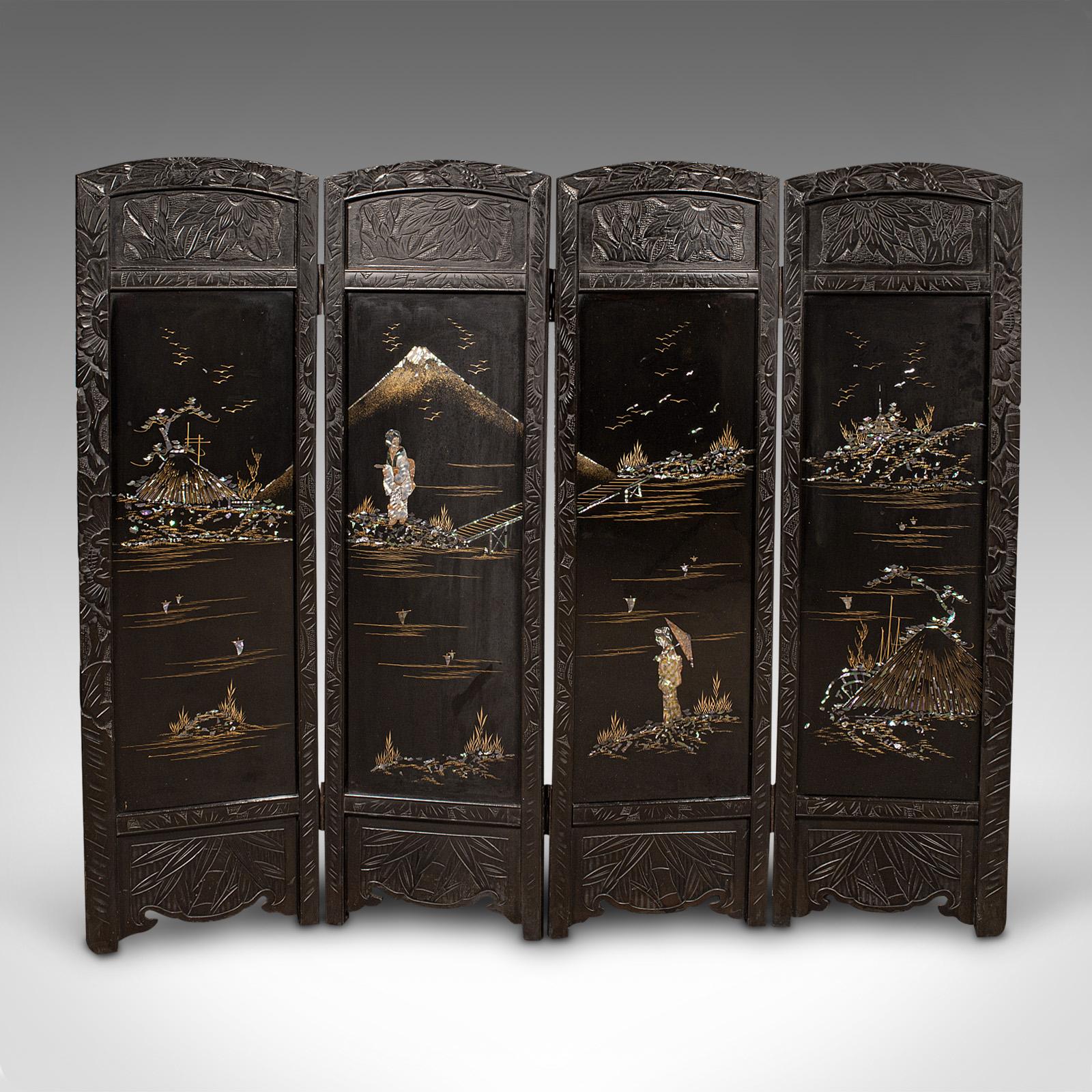 This is a vintage 4-panel Japanned screen. A Japanese, lacquer and glass room divider or fire guard, dating to the Art Deco period, circa 1930.

Decorative and distinctive - a versatile addition to any room
Displays a desirable aged patina and in