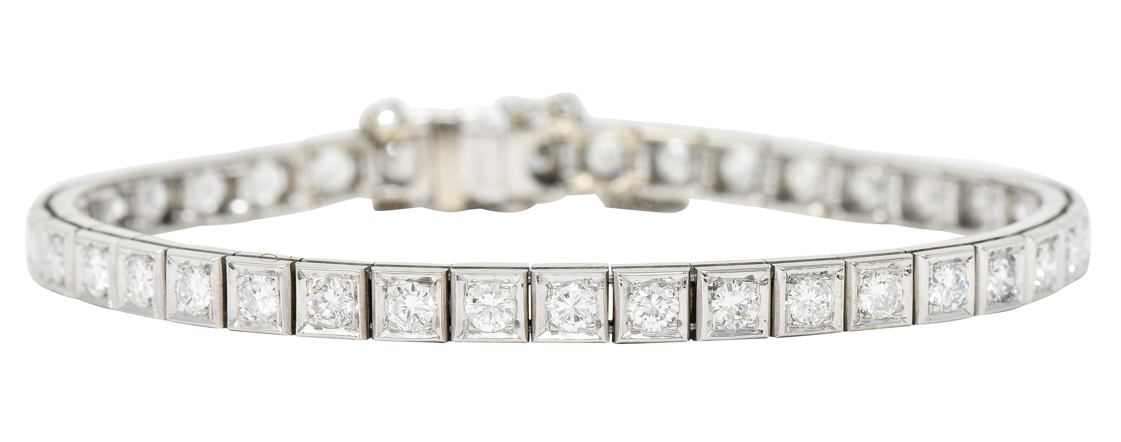 Line bracelet is comprised of articulated square form links. Each set with a round brilliant cut diamond. Weighing in total approximately 4.00 carats - H/I color with primarily VS2 to SI1 clarity.Completed by a concealed clasp with fold-over safety