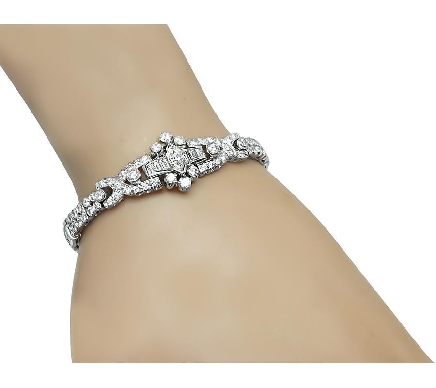 This is an amazing platinum bracelet from the Art Deco era. The bracelet is set with sparkling marquise, baguette and round cut diamonds that weigh approximately 4.00ct. The color of these diamonds is H with VS clarity. The bracelet measures 6 3/4