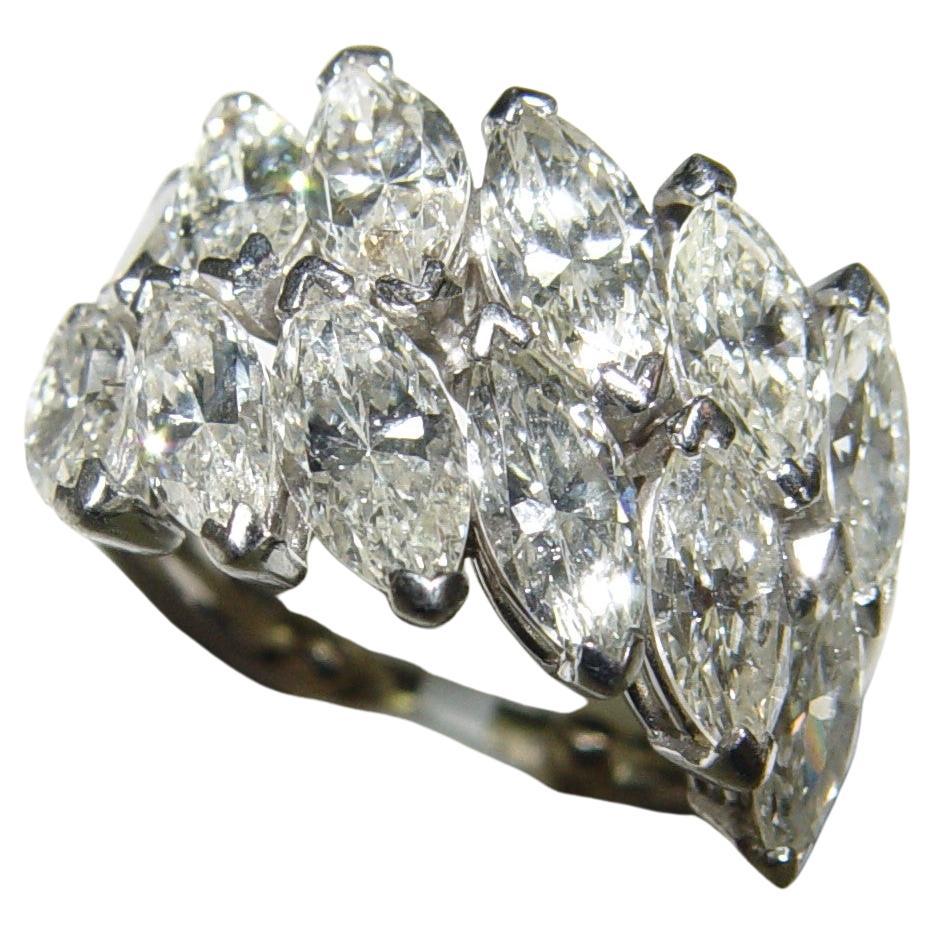 Vintage cocktail ring most likely from 1950's. Ring prong set with 12 Marquise Cut natural diamonds we estimate 4.00-4.50CT total weight (diamond carat weight is based on measurements the smallest diamonds measuring 6.5MM long and 3.5mm wide (2