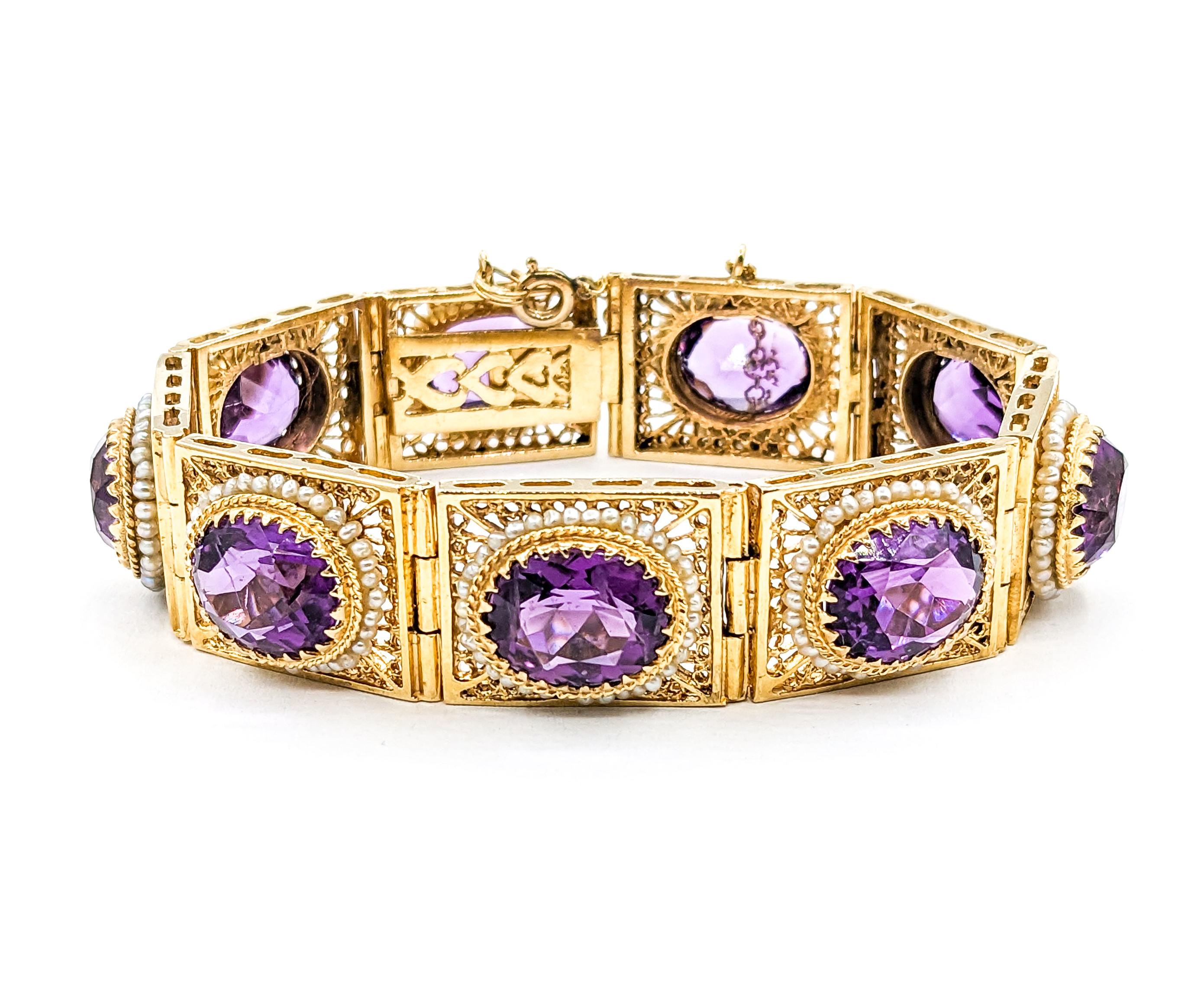 Vintage 40ctw Amethysts & Seed Pearls Bracelet In Yellow Gold

Indulge in the opulence of yesteryear with this magnificent vintage bracelet, lovingly crafted from 14kt yellow gold. It boasts an impressive array of oval amethysts, collectively