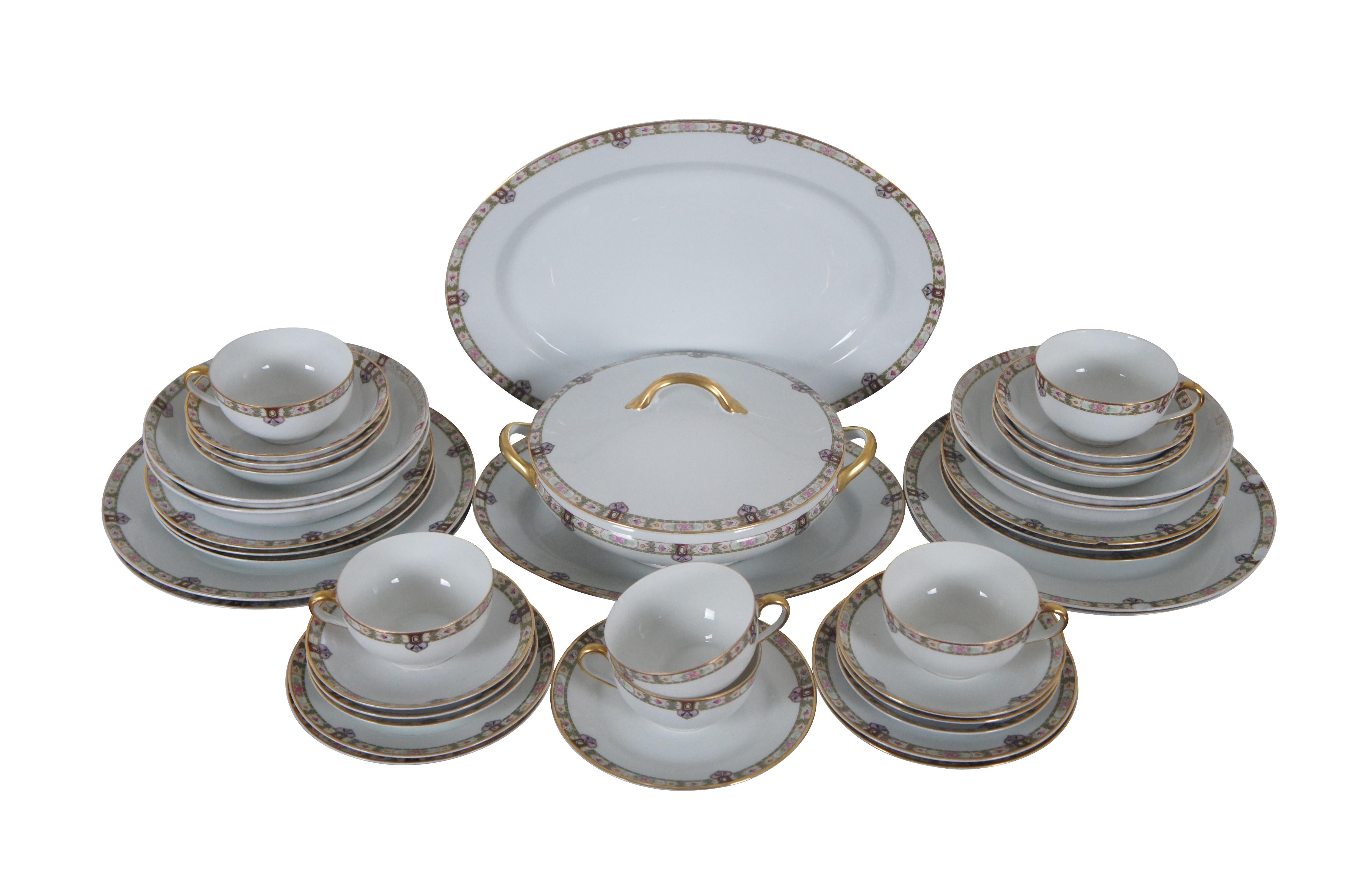 A lovely set of 41 pieces of mid 20th century fine china by Noritake, #13674. Features a Flower Band With Green & Cream.
Pattern: Regina by Noritake
Status: Discontinued. Circa: 1912 -

Dimensions:
Large Oval Platter - 14
