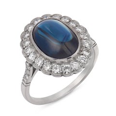 Vintage 4.10 carat cabochon cut sapphire diamond platinum ring