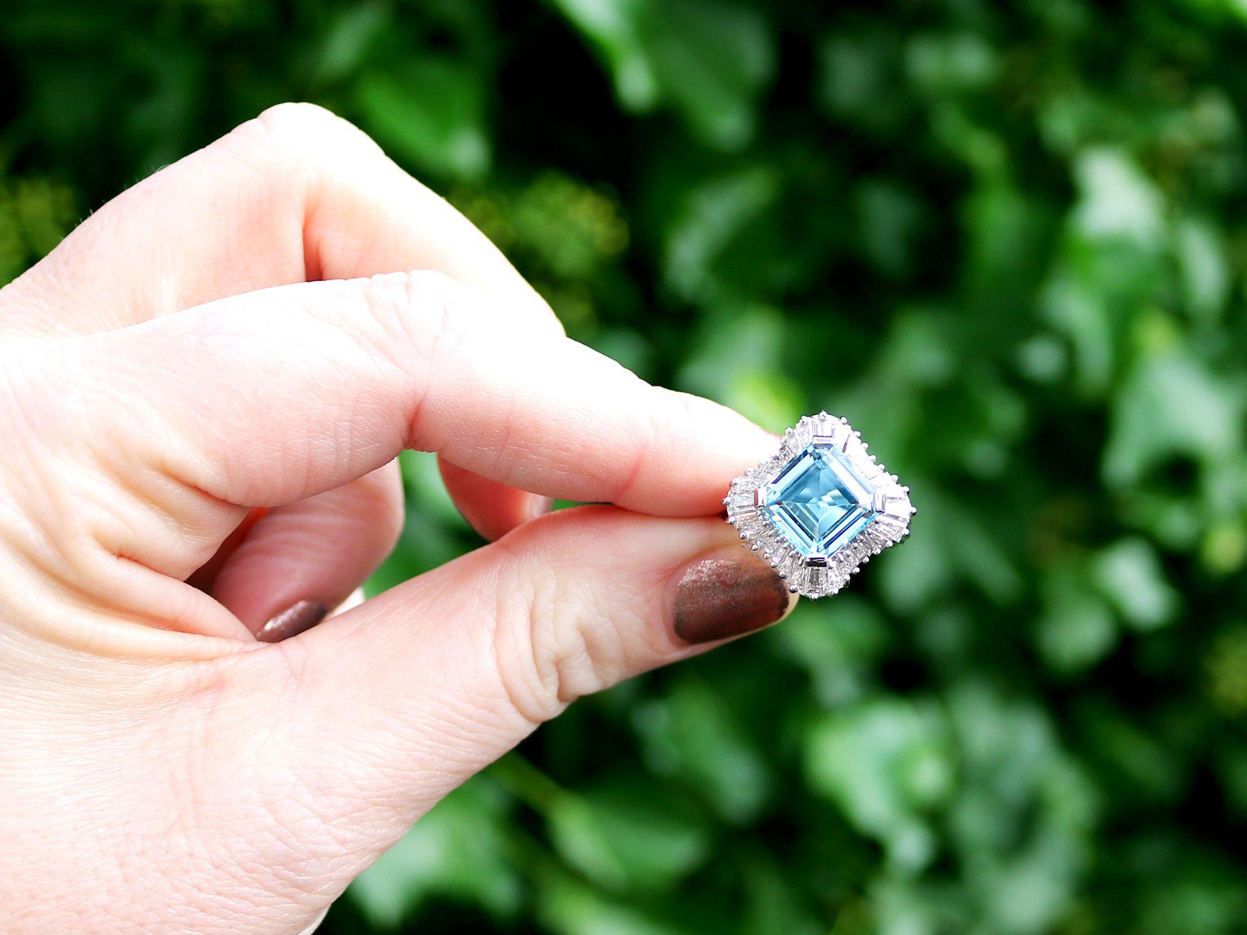 A stunning, fine and impressive 4.12 carat aquamarine and 1.95 carat diamond, platinum dress ring; part of our diverse vintage jewelry collections.

This stunning, fine and impressive vintage aquamarine and diamond ring has been crafted in