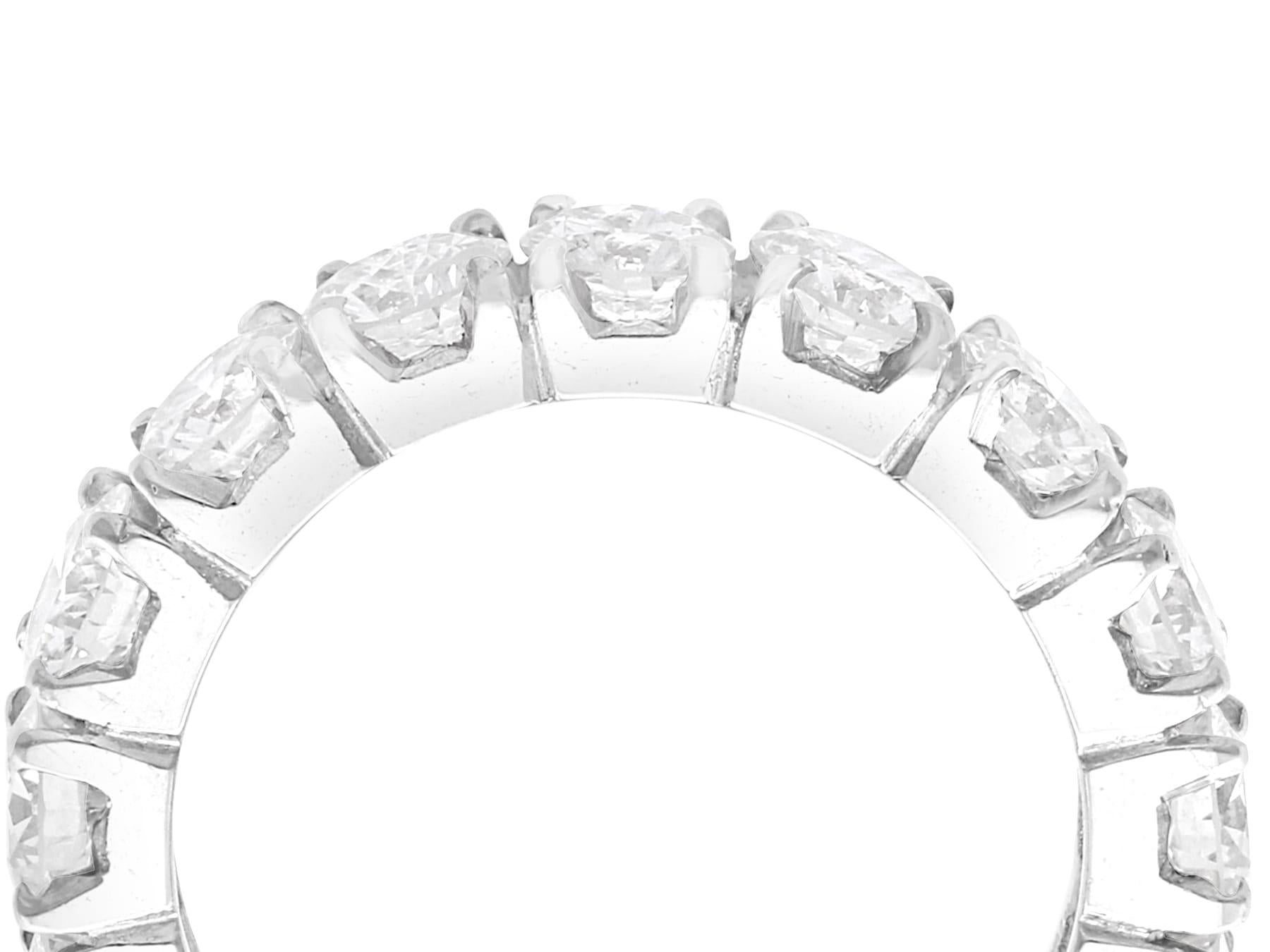 A stunning, fine and impressive vintage 4.12 carat diamond and 18 karat white gold full eternity ring; part of our diverse diamond rings collection.

This stunning, fine and impressive white gold eternity ring has been crafted in 18k white