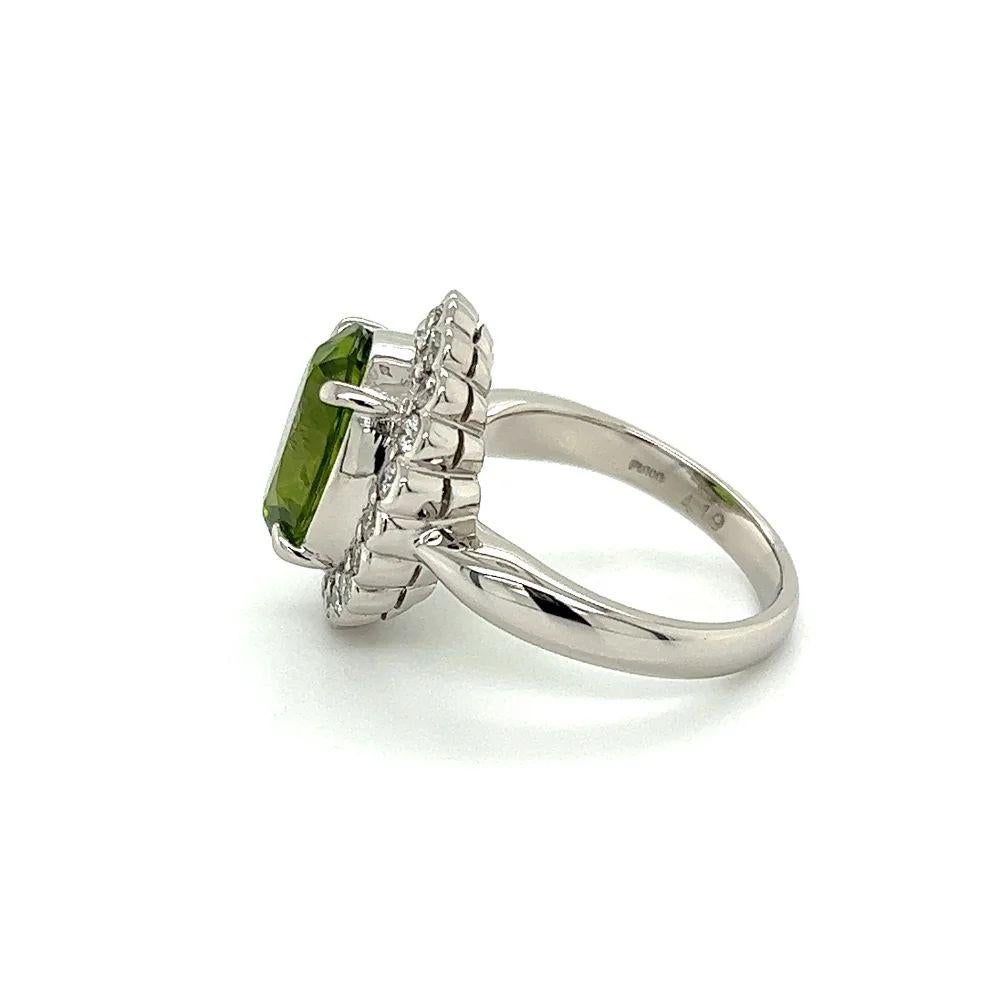 Women's Vintage 4.19 Carat Oval Peridot and Diamond Platinum Halo Ring For Sale