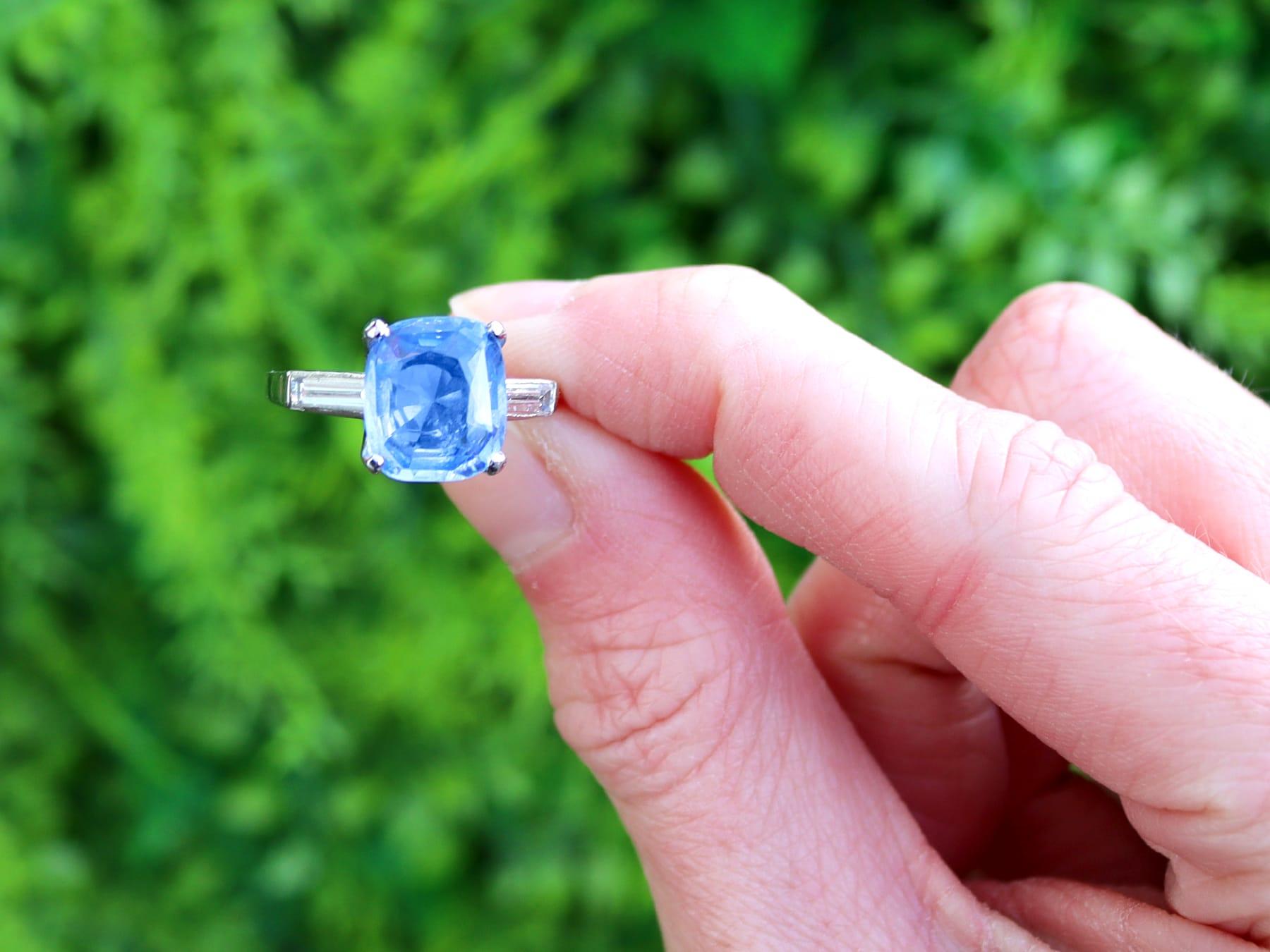A stunning, fine and impressive vintage 4.20 carat Ceylon sapphire and 0.40 carat diamond, platinum ring; part of our diverse unheated sapphire jewelry collections.

This stunning, fine and impressive vintage ring has been crafted in platinum.

The