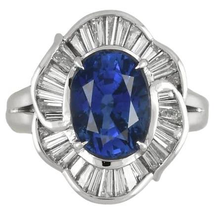 Vintage 4.20 Carat GIA Oval Ceylon Sapphire and Baguette Diamond Platinum Ring For Sale
