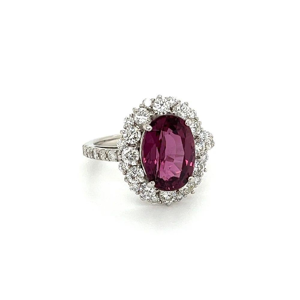 Simply Beautiful! Impressive Oval captivating GIA Purplish Red Spinel and Diamond Platinum Vintage Cocktail Ring. Centering a securely nestled, Hand set Rare Natural Oval Spinel GIA, weighing 4.27 Carat. GIA report #1443687222. Surrounded and