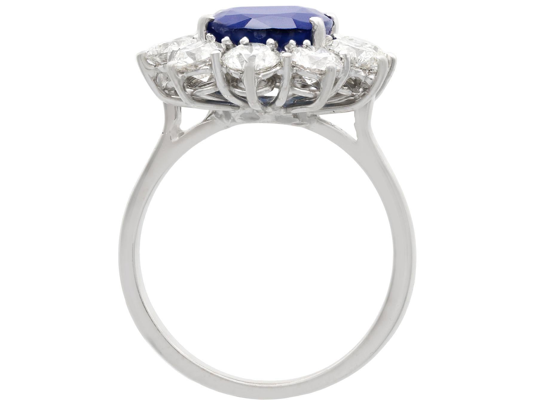 Round Cut Vintage 4.29 Carat Sapphire and 1.80 Carat Diamond White Gold Cluster Ring
