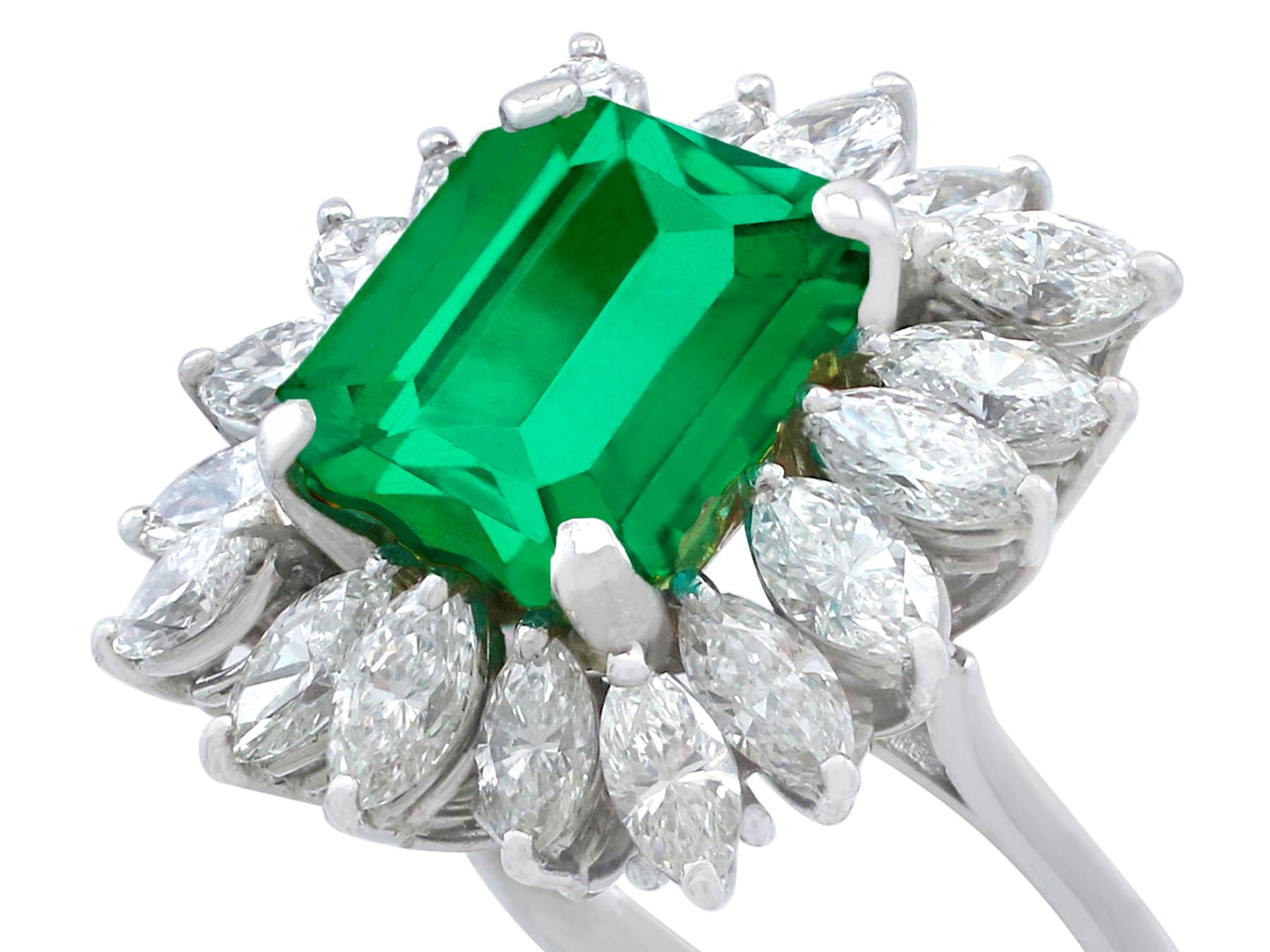 Vintage 4.30 Carat Emerald and 3.24 Carat Diamond White Gold Cluster Ring In Excellent Condition For Sale In Jesmond, Newcastle Upon Tyne
