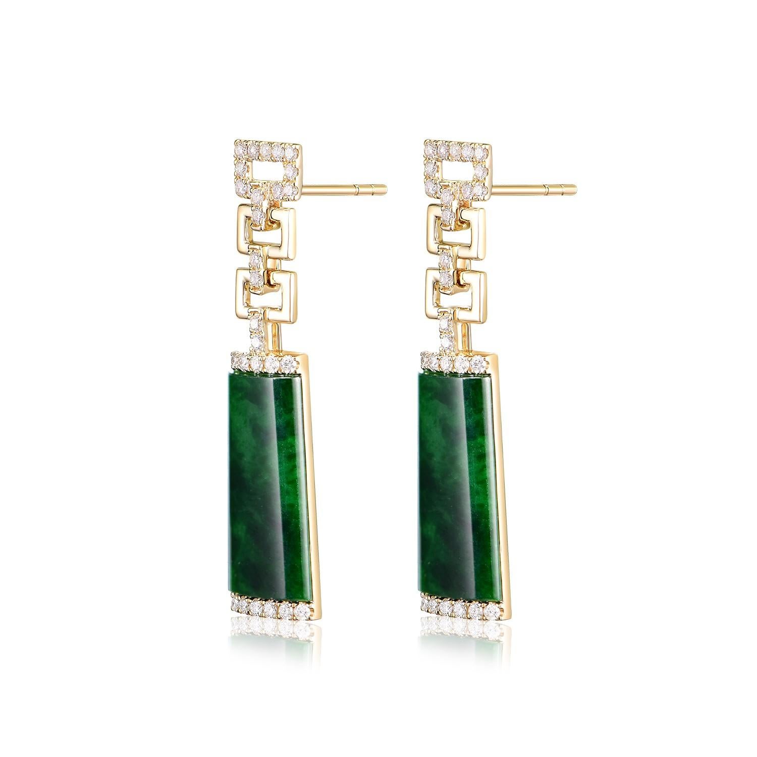 These elegant drop earrings are a true vintage treasure, featuring luscious 4.50-carat jade stones as the centerpiece. The jade boasts a deep, rich green hue, embodying the serenity and grace of this revered gemstone, and is beautifully complemented