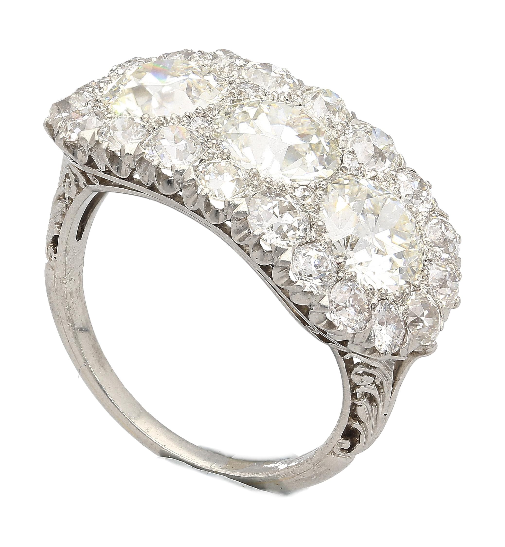 Vintage 4.50 CTTW Old European Cut Diamond Three-Stone Platinum Engagement Ring  For Sale 2