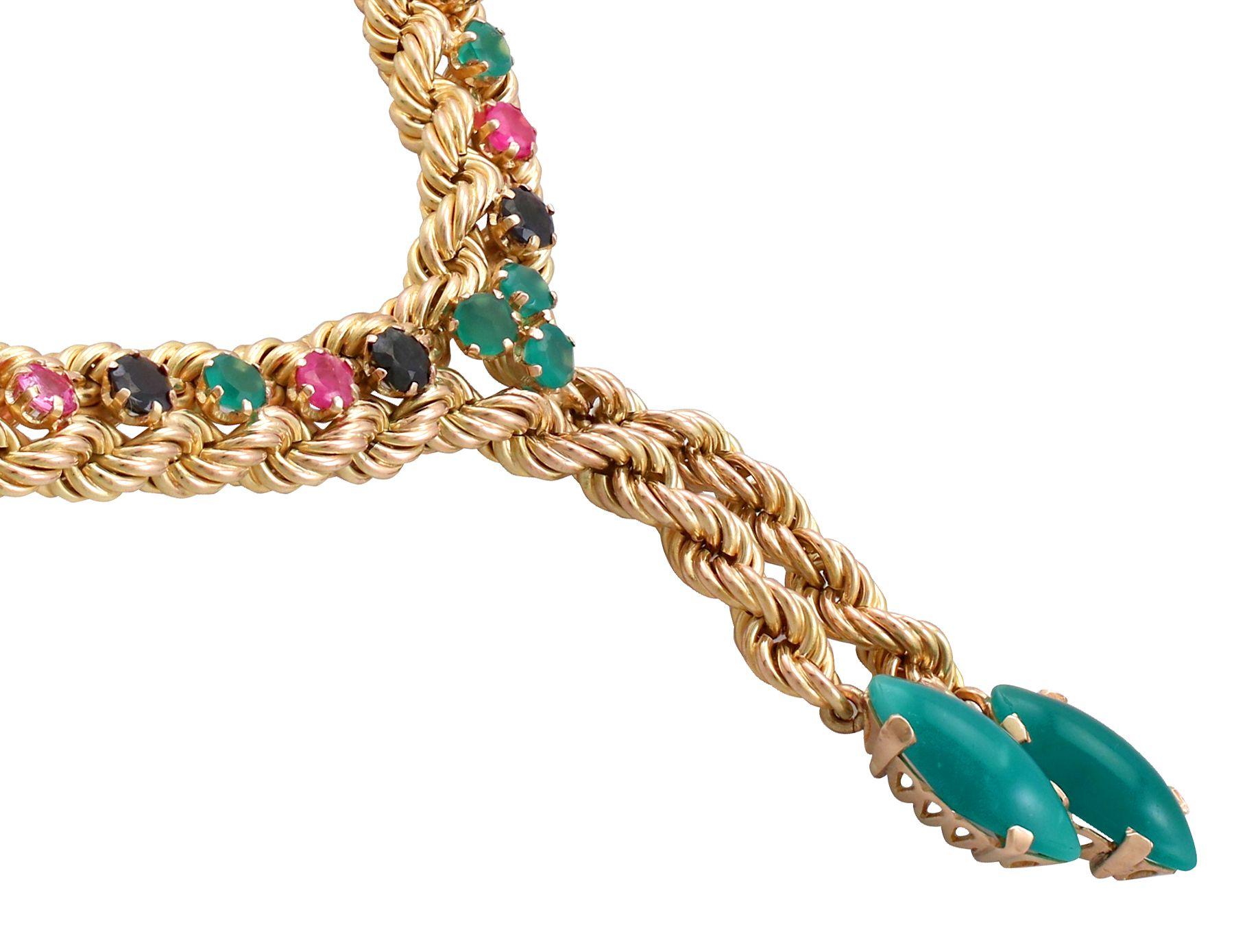 An impressive European 4.5 carat ruby, 4.18 carat sapphire, 9.02 carat chrysoprase and 14 karat yellow gold necklace; part of our diverse gemstone jewelry collections.

This fine and impressive gemstone rope chain necklace has been crafted in 14k
