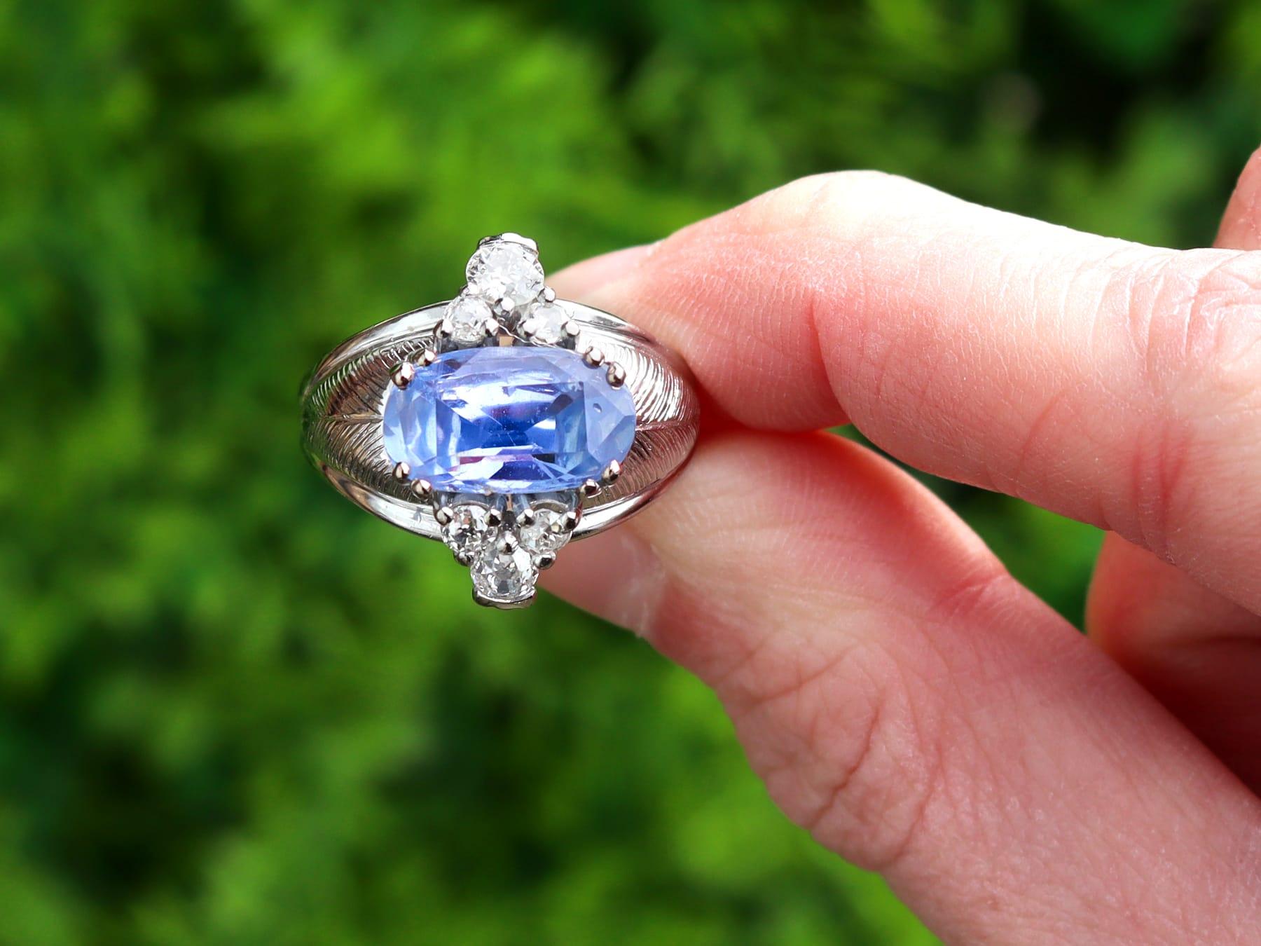A stunning, fine and impressive vintage 4.60 carat Ceylon blue sapphire and antique 0.82 carat diamond, 18 karat white gold dress ring; an addition to our diamond and gemstone jewellery and estate jewelry collections.

This fine and impressive