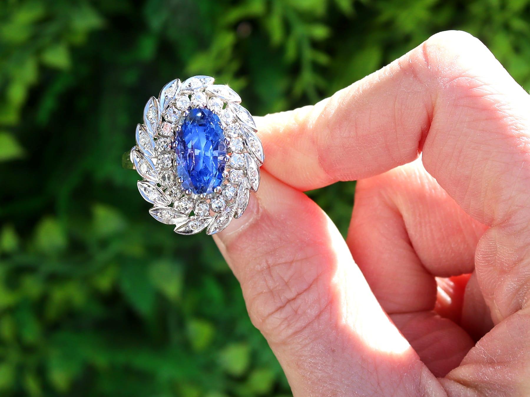 A stunning 4.80 carat Ceylon sapphire and 1 carat diamond , 9 karat white gold cluster style dress ring; part of our diverse vintage jewellery and estate jewelry collections

This stunning, fine and impressive vintage sapphire and diamond ring has