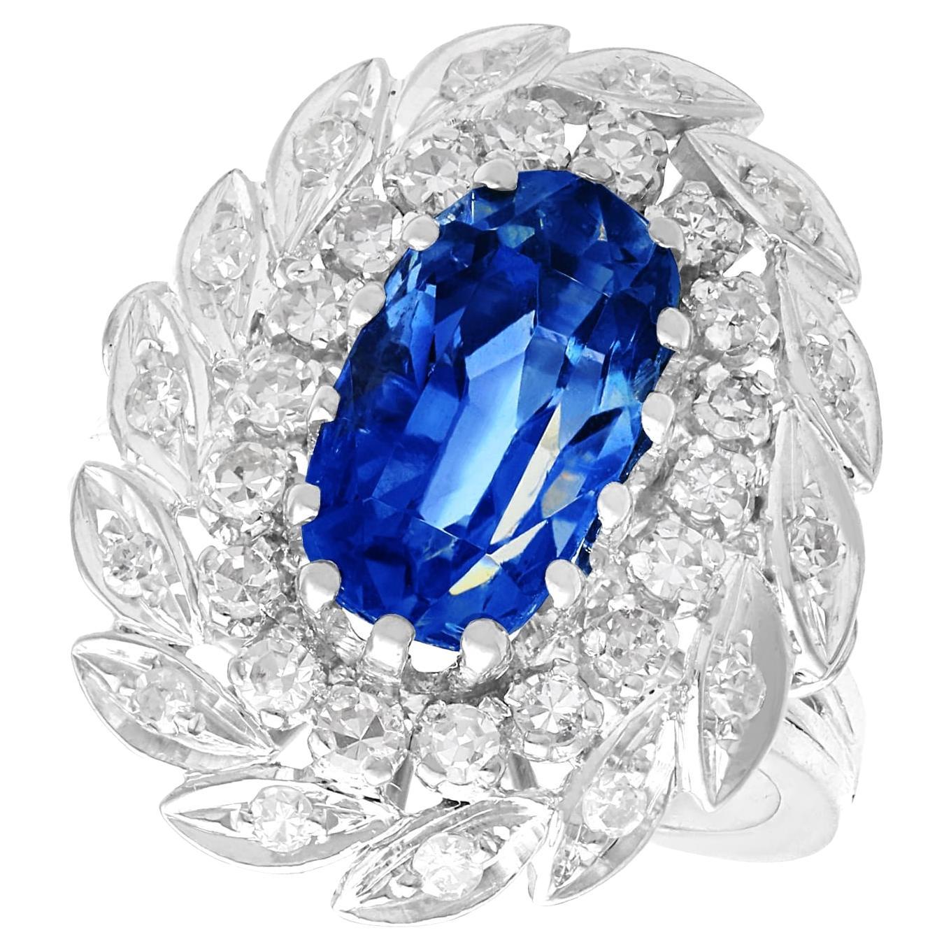 Vintage 4.80 Carat Sapphire and 1 Carat Diamond White Gold Cluster Ring For Sale