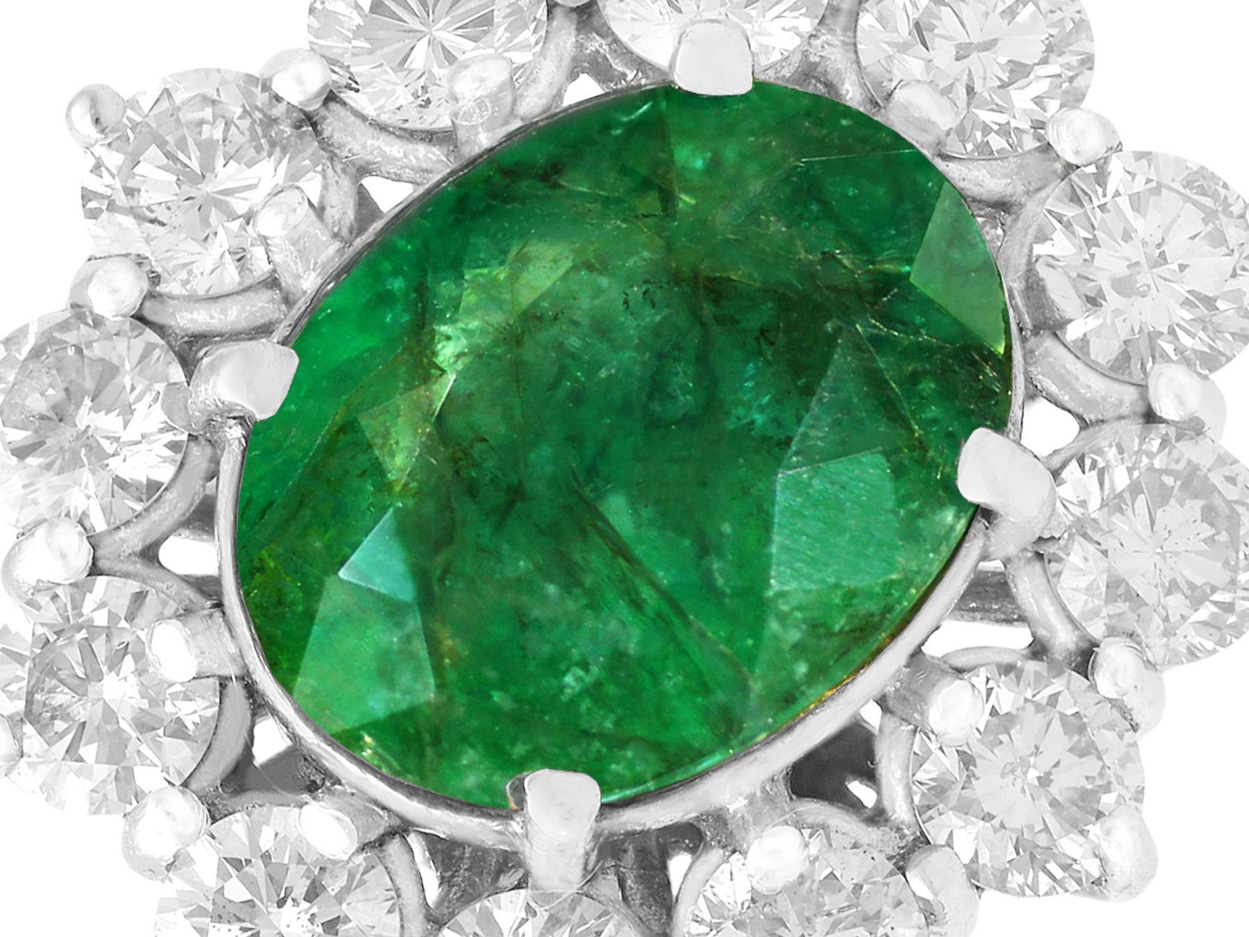 Emerald Cut Vintage 4.82 Carat Emerald 3.12 Carat Diamond White Gold Cluster Ring For Sale