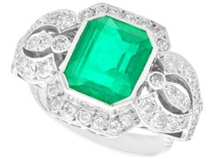 Vintage 4.85ct Emerald and 1.80ct Diamond, 9ct Gold Dress Ring