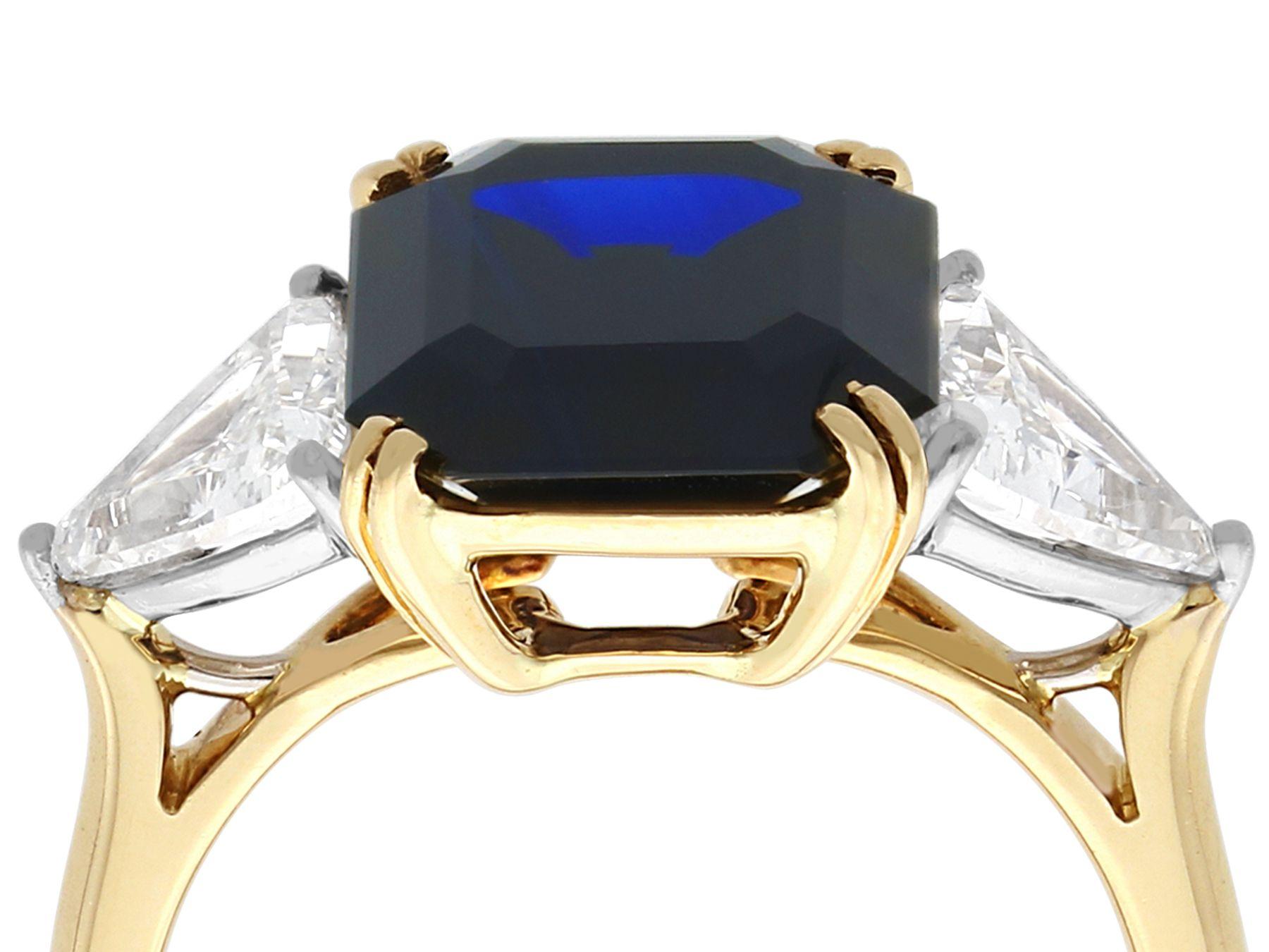 A stunning vintage 4.91 carat natural Basaltic sapphire and 1.16 carat diamond, 18 karat yellow and white gold trilogy ring; part of our diverse vintage jewelry and estate jewelry collections.

This stunning, fine and impressive vintage sapphire
