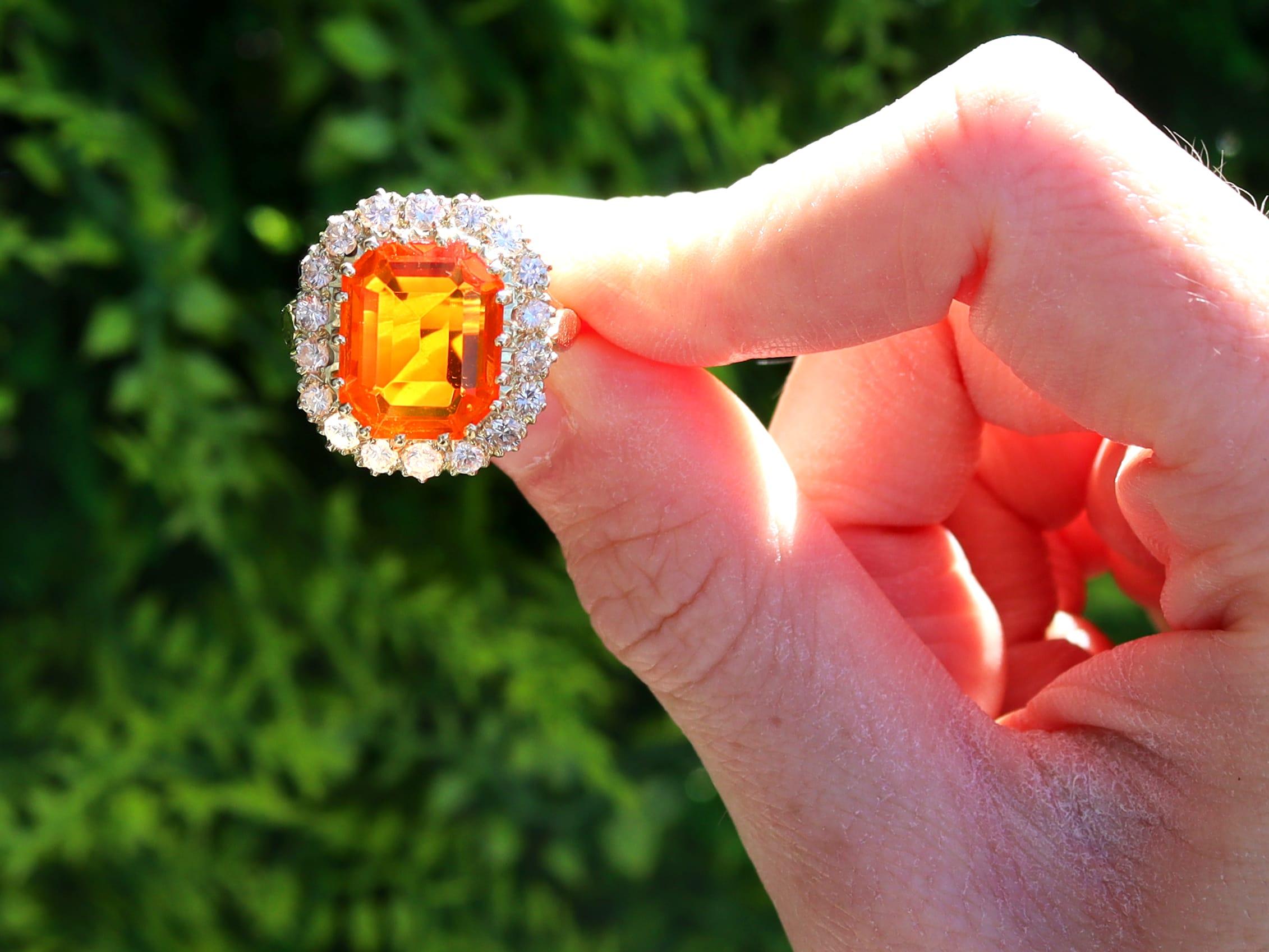 A stunning, fine and impressive vintage English 4.92 carat fire opal and 1 carat diamond, 18 karat yellow gold dress ring; part of our diverse vintage opal jewellery collections.

This stunning vintage opal engagement ring has been crafted in 18k