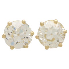 Boucles d'oreilles solitaires en platine avec diamant de taille européenne de 4,93 ct.