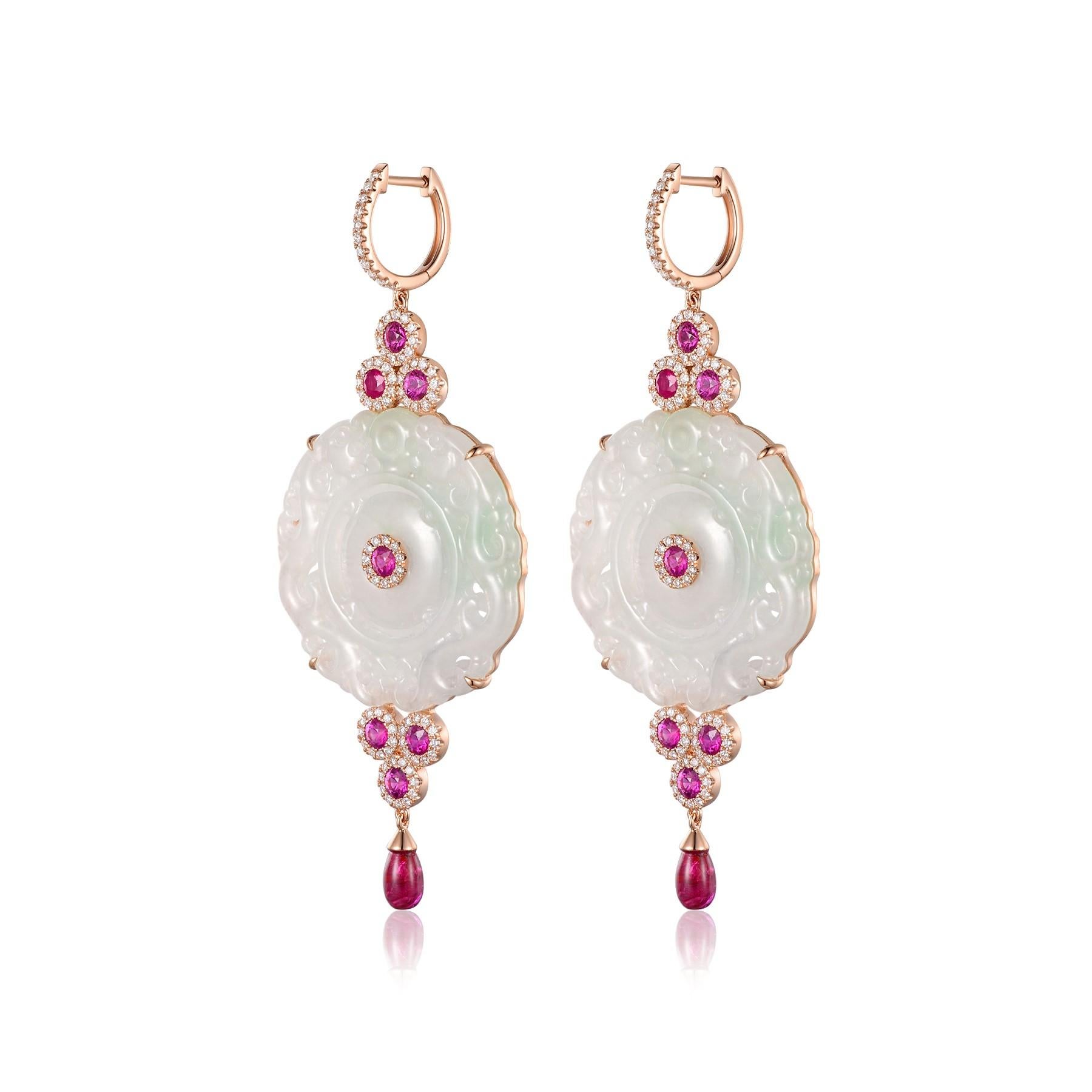 Step into a world of luxurious elegance with our White Jadeite Rubies Diamond Dangle Earrings, intricately designed to cater to your discerning taste. These masterpieces combine the purity of handcrafted white jadeite, the passion of rubies, and the