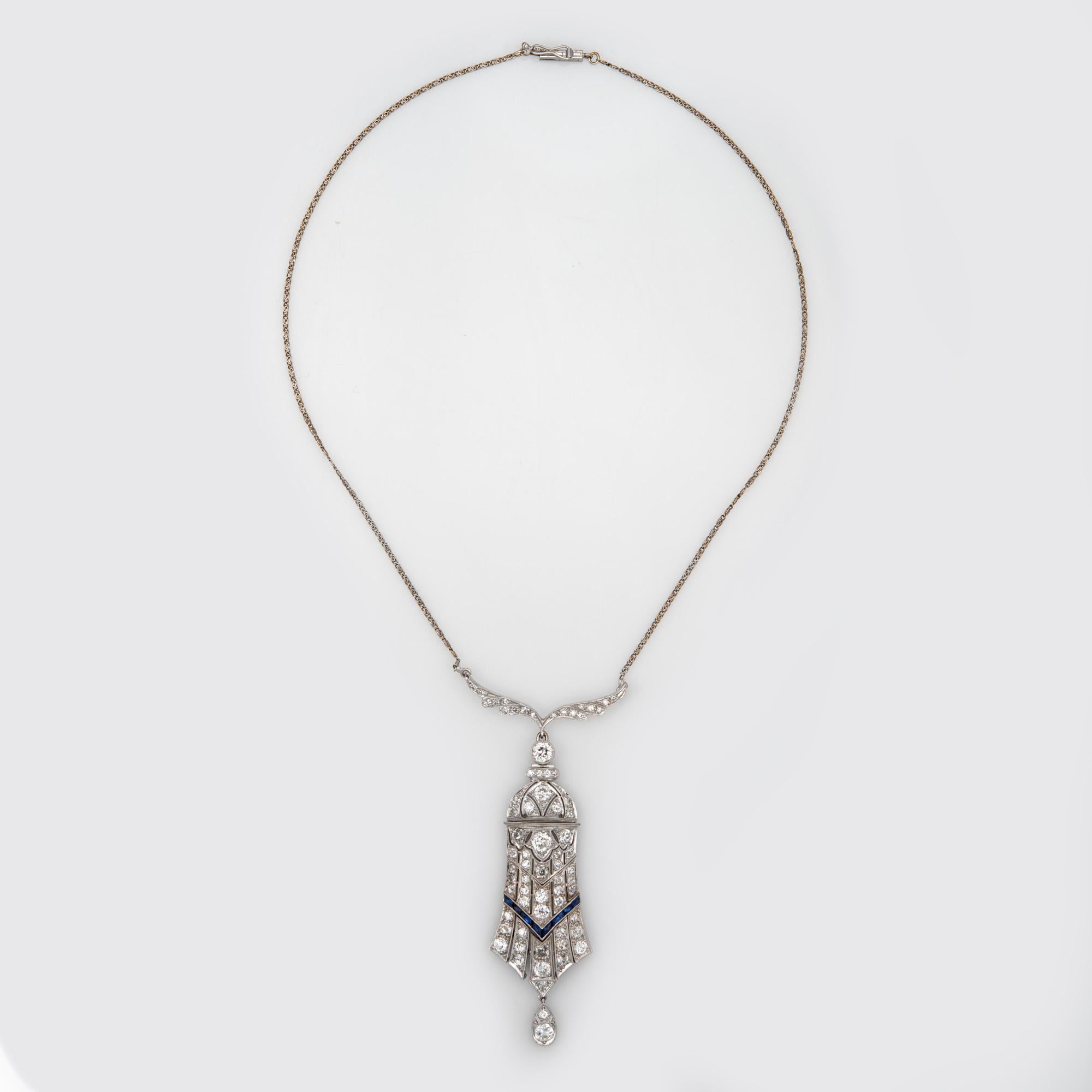 Finely detailed vintage Art Deco era diamond necklace (circa 1920s to 1930s), crafted in 14 karat white gold (chain) and platinum.  

Old European cut diamonds total an estimated 4 carats. Small French cut sapphires (lab) accent the mount. The