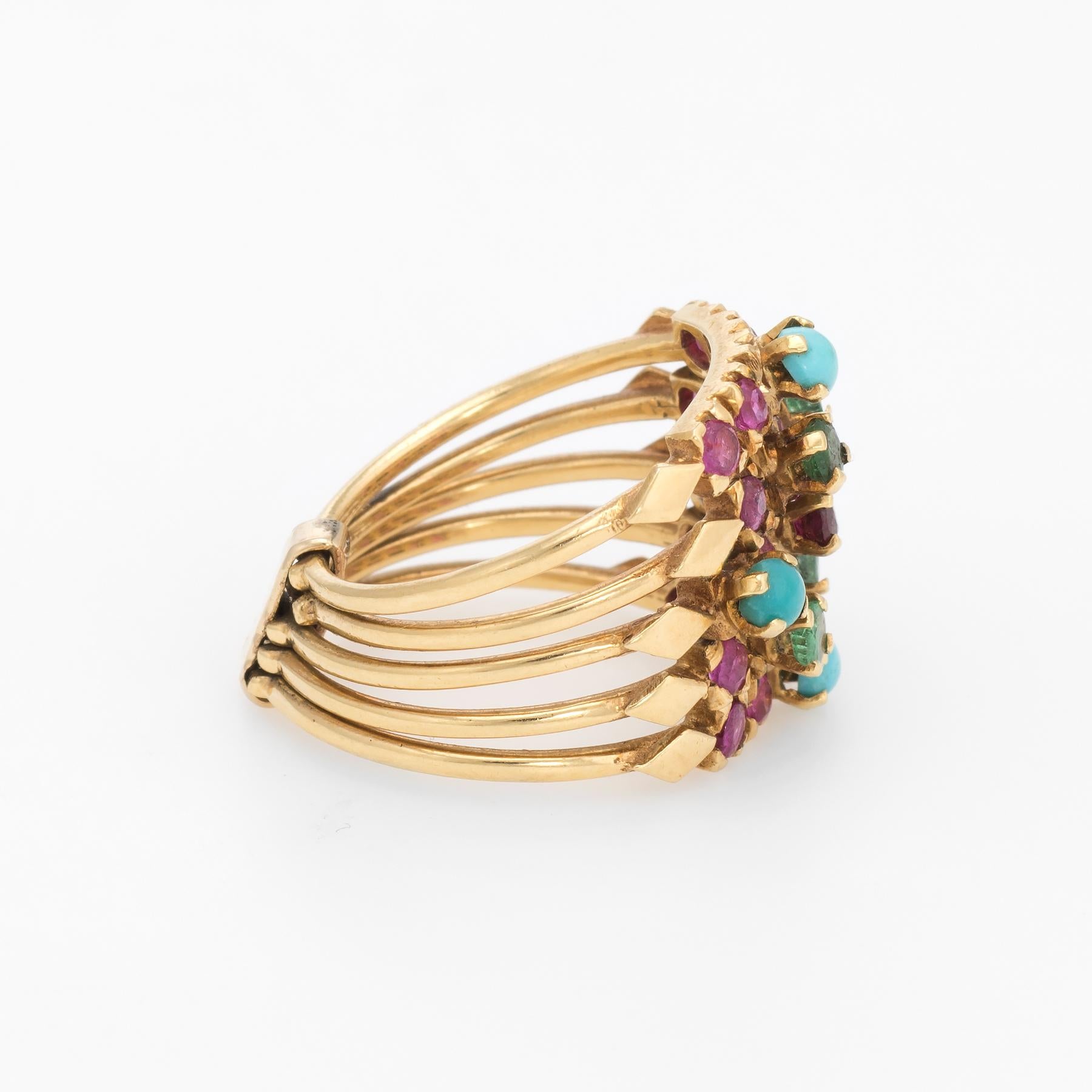 Distinct & stylish 5 band gemstone set harem ring (circa 1950s to 1960s), crafted in 18 karat yellow gold. 

Turquoise measures 2.75mm (each), rubies measure 2mm (each) and emeralds measure 2.5mm (each). Few very tiny chips to a few of the gemstones