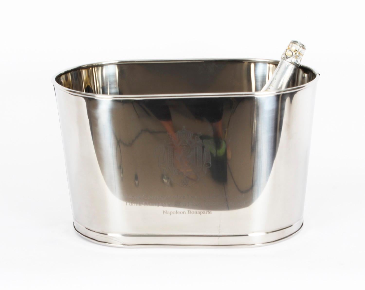This is an elegant  Vintage silver plated champagne cooler, dating from the late 20th Century.

This alluring item is perfectly suited to a party, and can easily accommodate five bottles. It brings with it a touch of sophistication and class that it