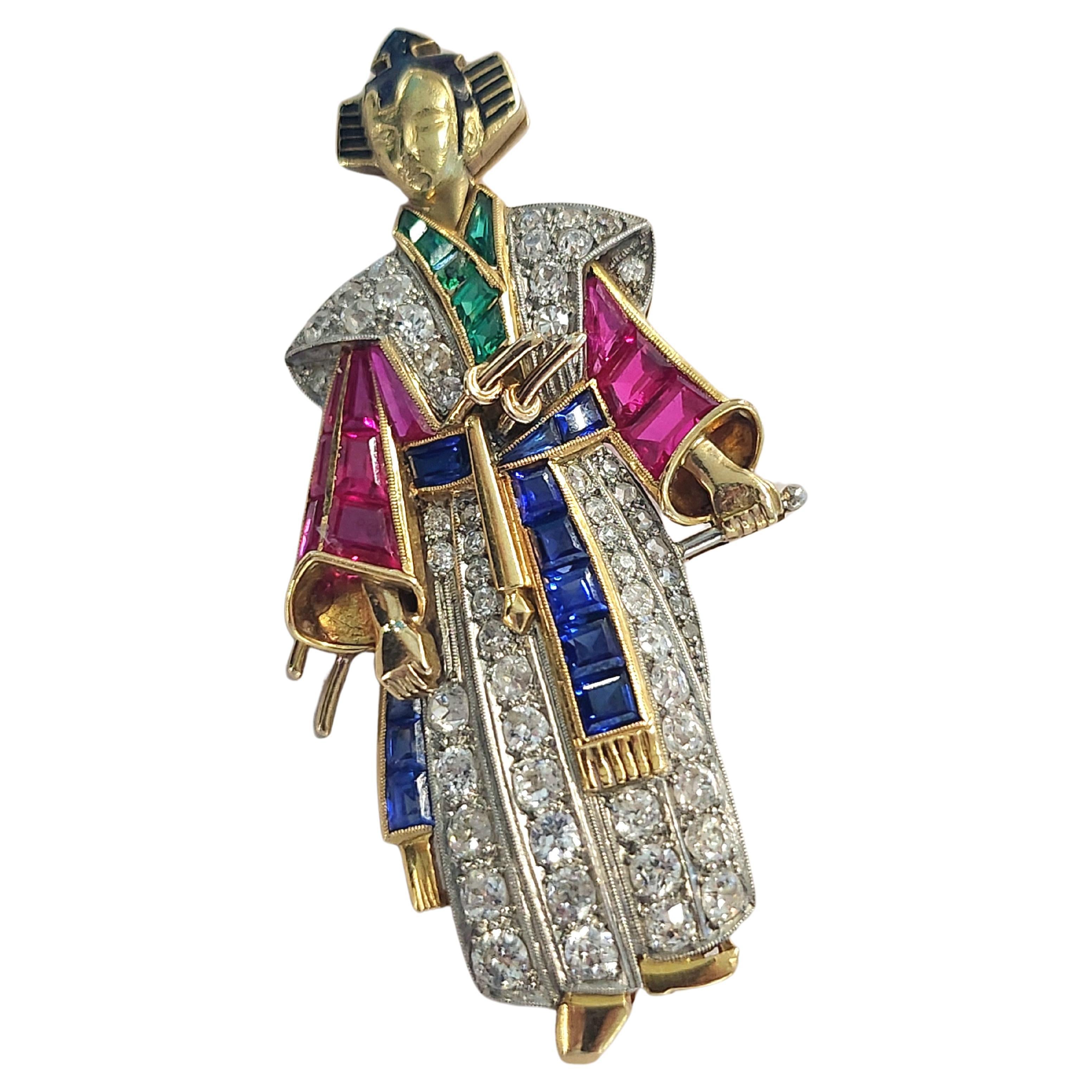 Vintage lare unuswal 18k gold brooch in samurai figure with estimate brilliant cut diamonds weight 5 carats H color white vs clearity and natural navy blue sapphires and nutural rubies 