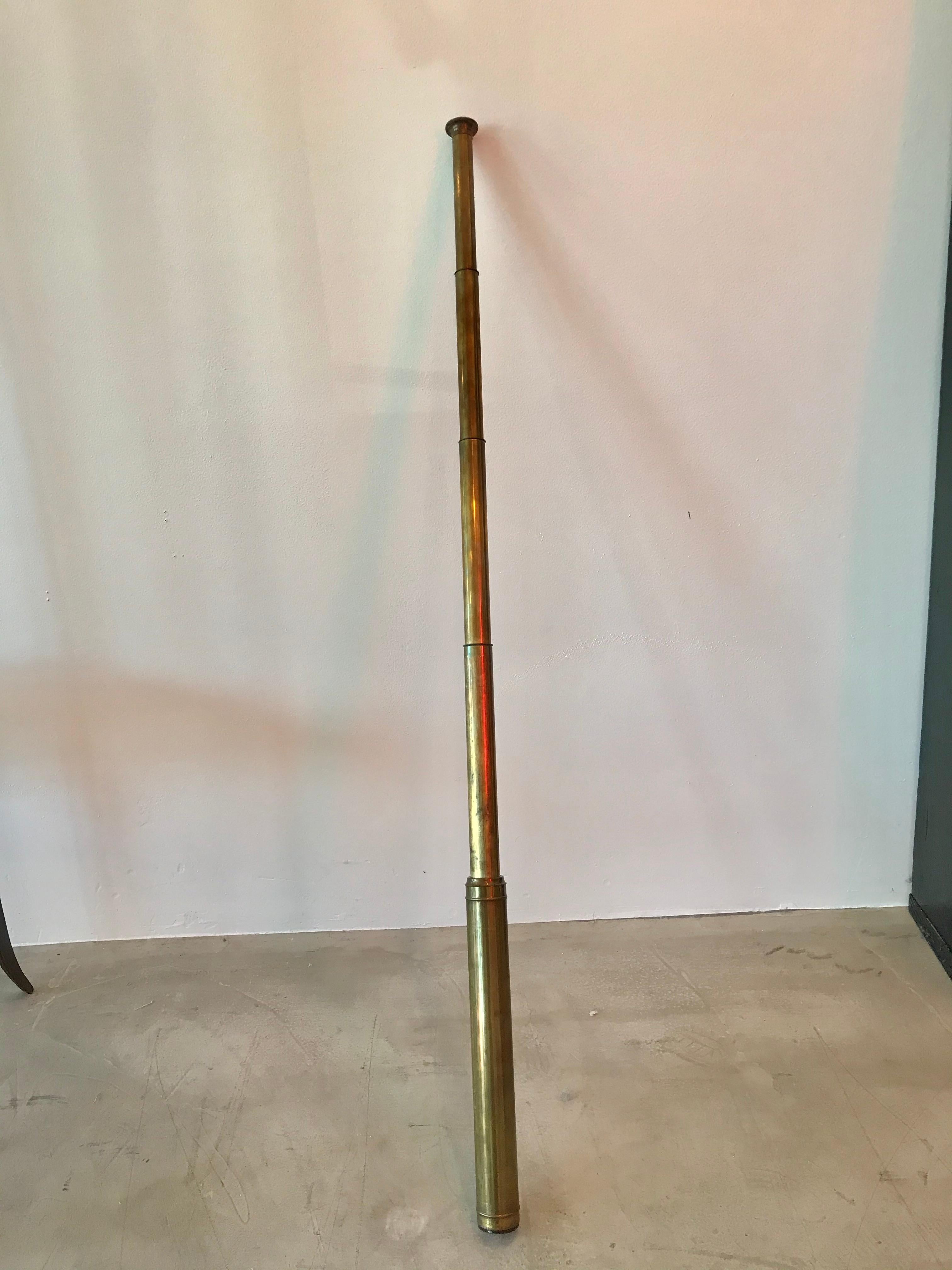 Vintage brass 5 draw extendable hand telescope. Comes with original cap to cover glass end and brass eyepiece cover that slides in and out of place. Unusually long telescope at just over 3.5 feet fully extended. Good vintage condition.