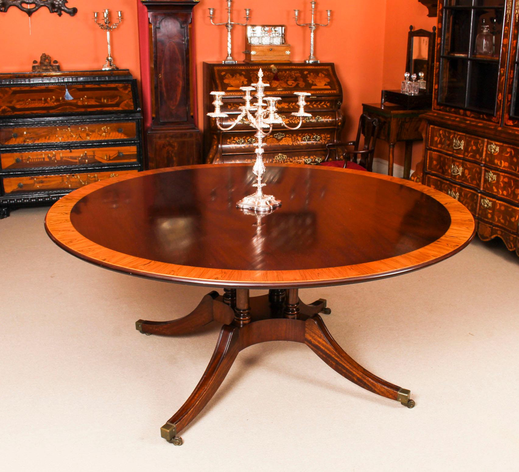 This beautiful Regency style flame mahogany dining table was made by the Master Cabinet makers Millwood, of Wittersham Kent, and bears their brass label on the underside, it can seat eight people in comfort and is circa 1970 in date.

The fabulous