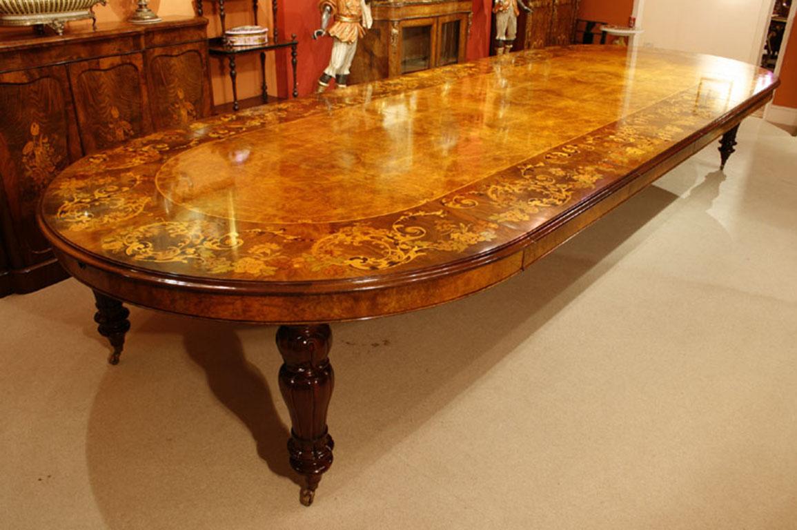 This is a fantastic vintage Victorian Revival marquetry dining table.

The table is made from burr walnut which has a really beautiful grain and to highlight the grain it has been French polished by hand. French polish is an alcohol and shellac