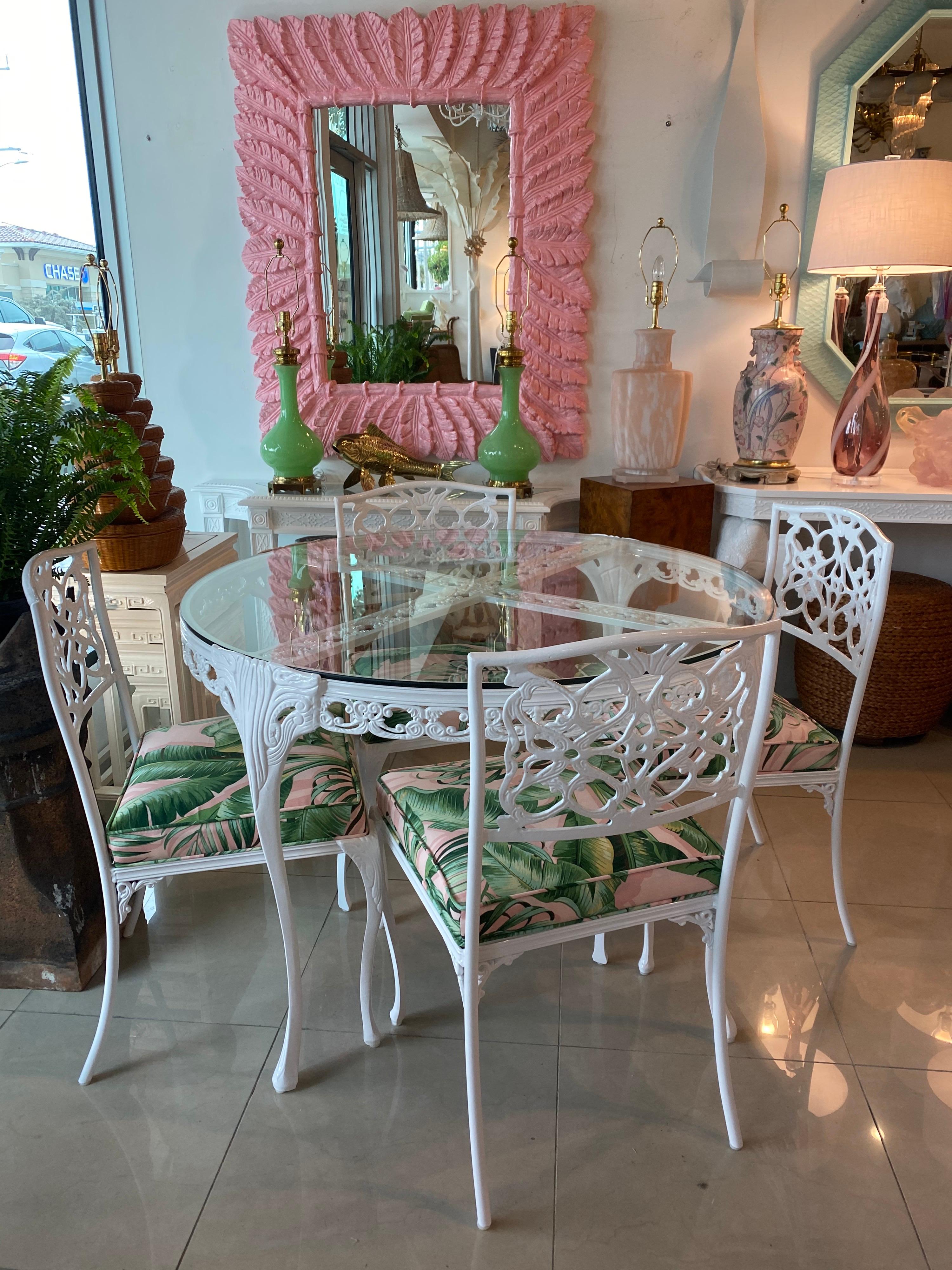 Beautiful vintage patio outdoor set. This can be placed indoors or outdoors. Set includes dining table and 4 chairs. The glass top is vintage and may have some scratches, scuffs but no chips or breaks. This set has been newly powder-coated in white.