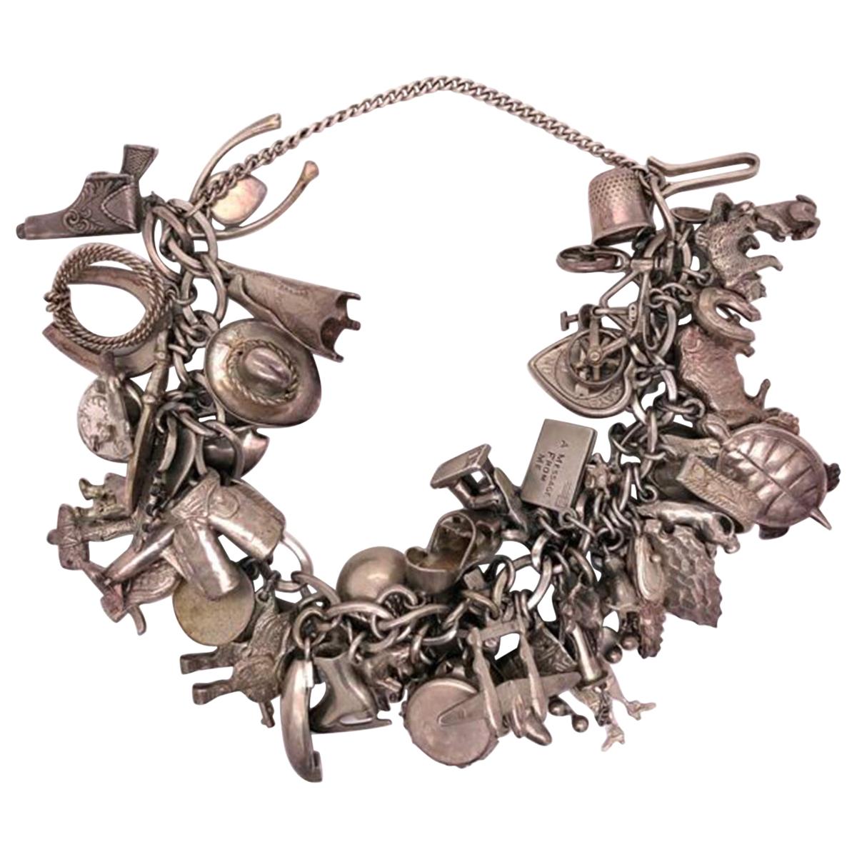 Vintage 50 Piece Sterling Silver Charm Bracelet Great Estate Jewelry Find